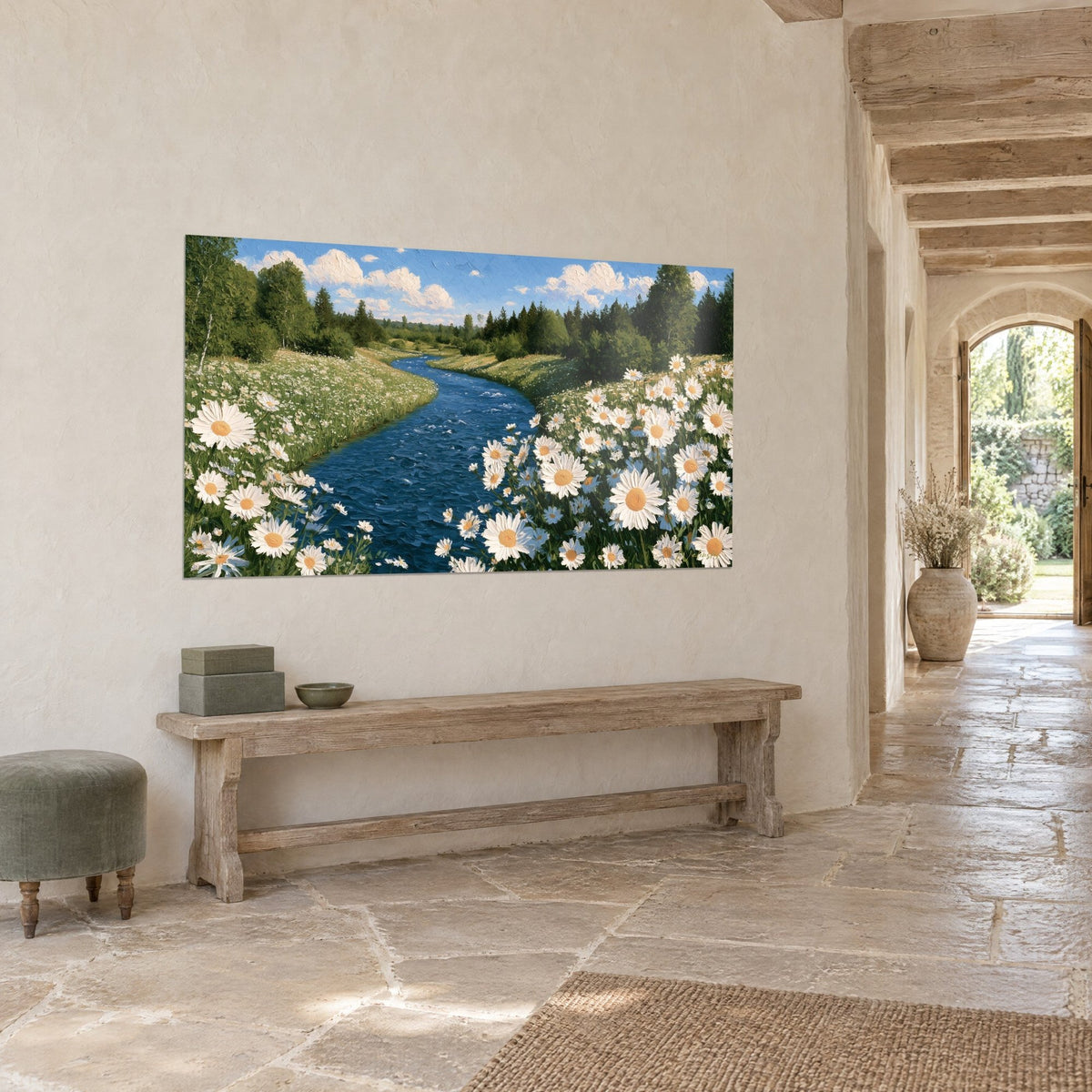 Wall art indigo stream lined with large daisies with orange centres, cloudy azure sky, on a beige wall near a stone vaulted corridor