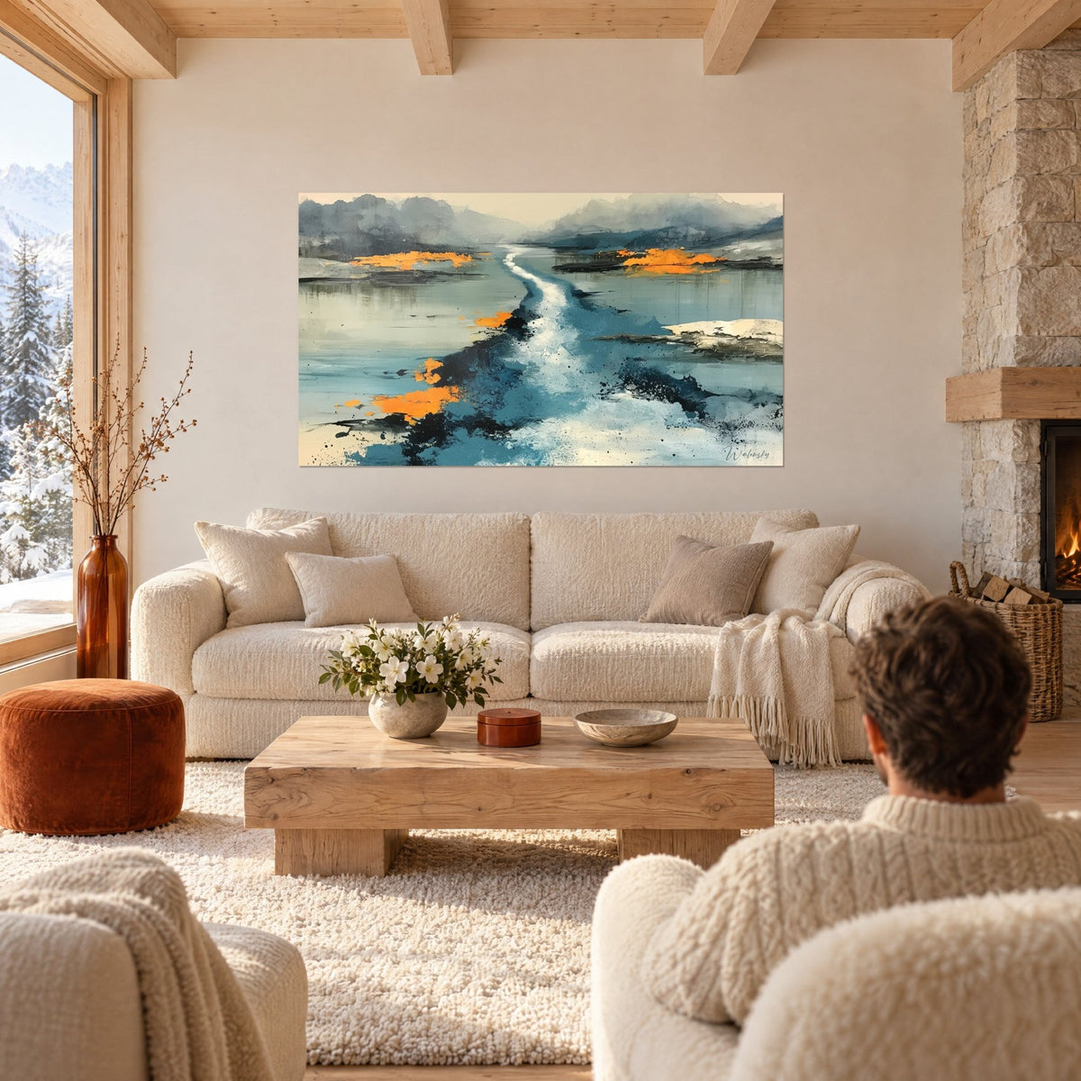Schilderij van een turquoise rivier die zich slingert naar de horizon, felle oranje lichtflitsen en grijze nevels, boven een bank in een lichte woonkamer