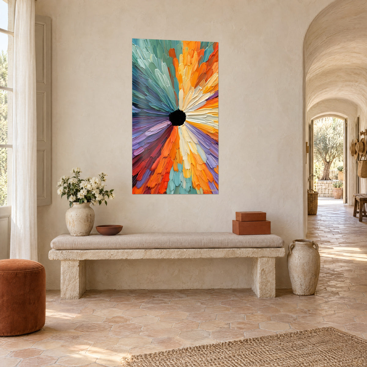 Wall art giant flower corolla seen head-on, saffron, lilac and cream petals radiating around a black center, in a Provençal stone farmhouse