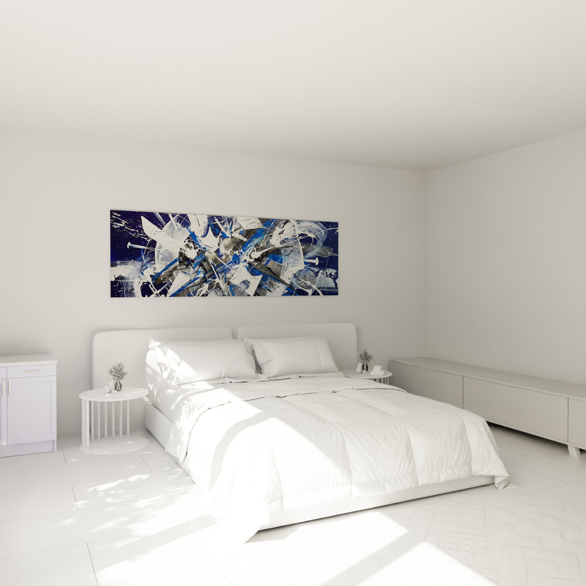 Projections anthracite et blanches de ce tableau style peinture au-dessus d'un lit dans une chambre claire
