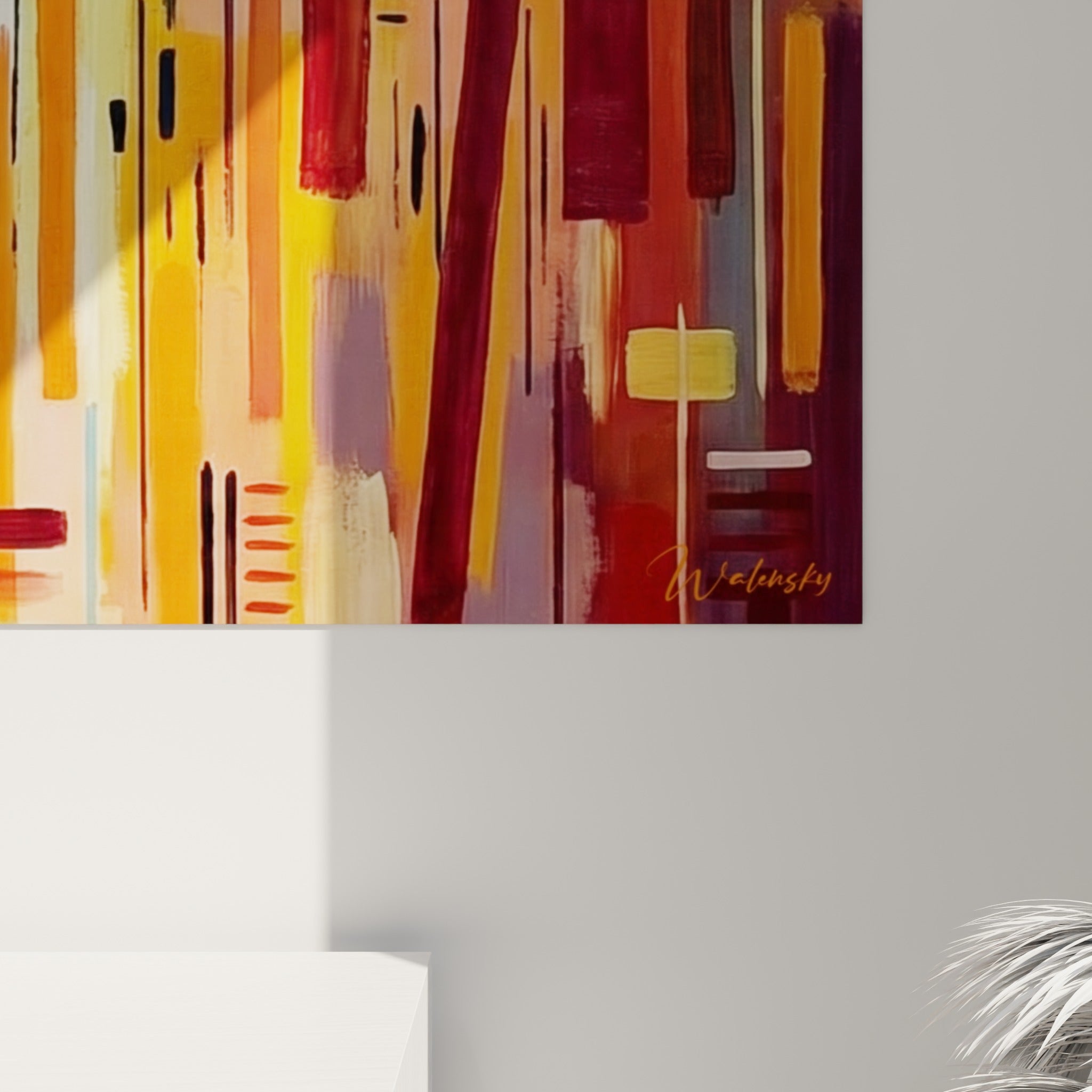 Empâtements visibles entre le bleu marine et le jaune moutarde sur la toile accrochée