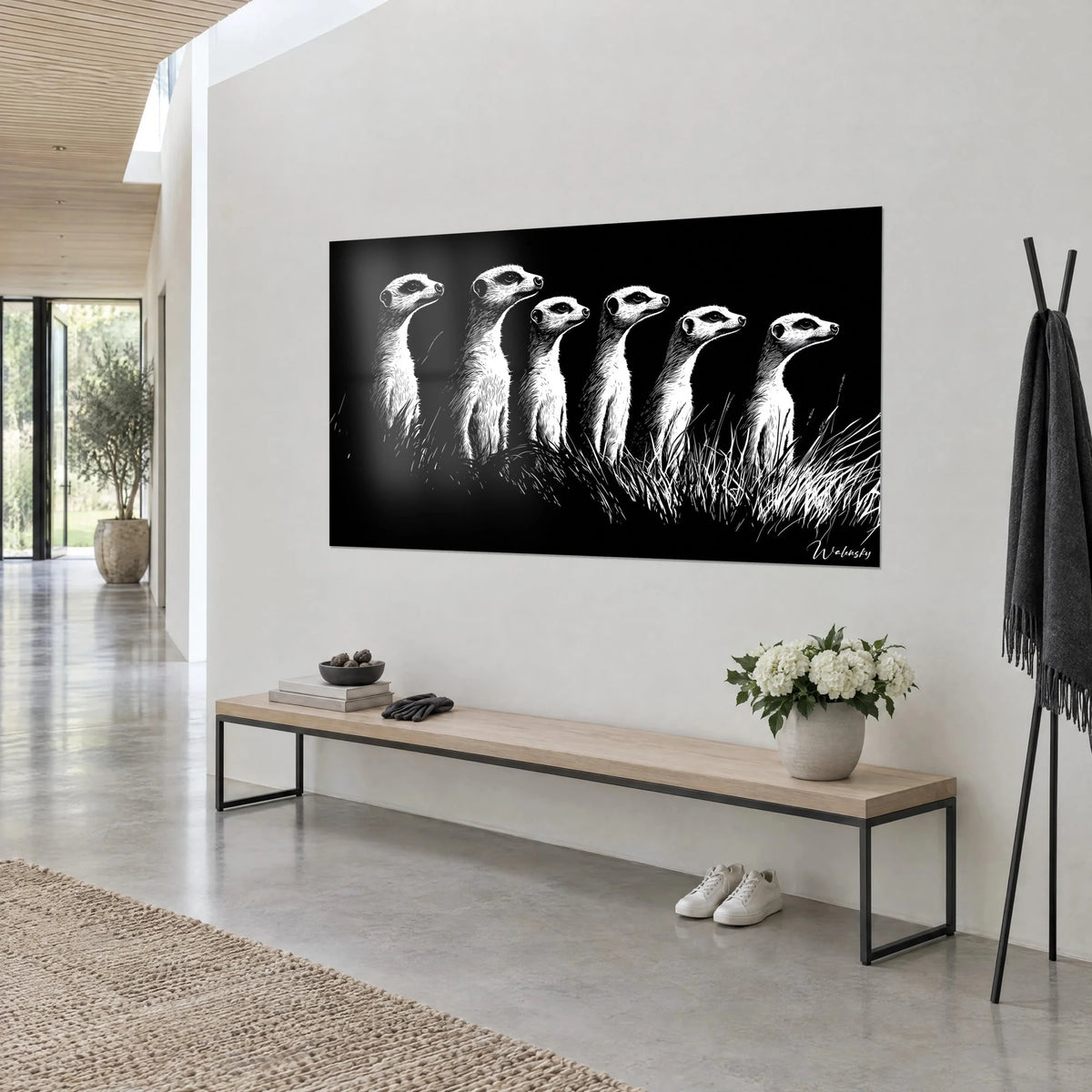 Wall art six meerkats standing in a row, ivory striped fur on ink black, three-quarter view above a wooden bench
