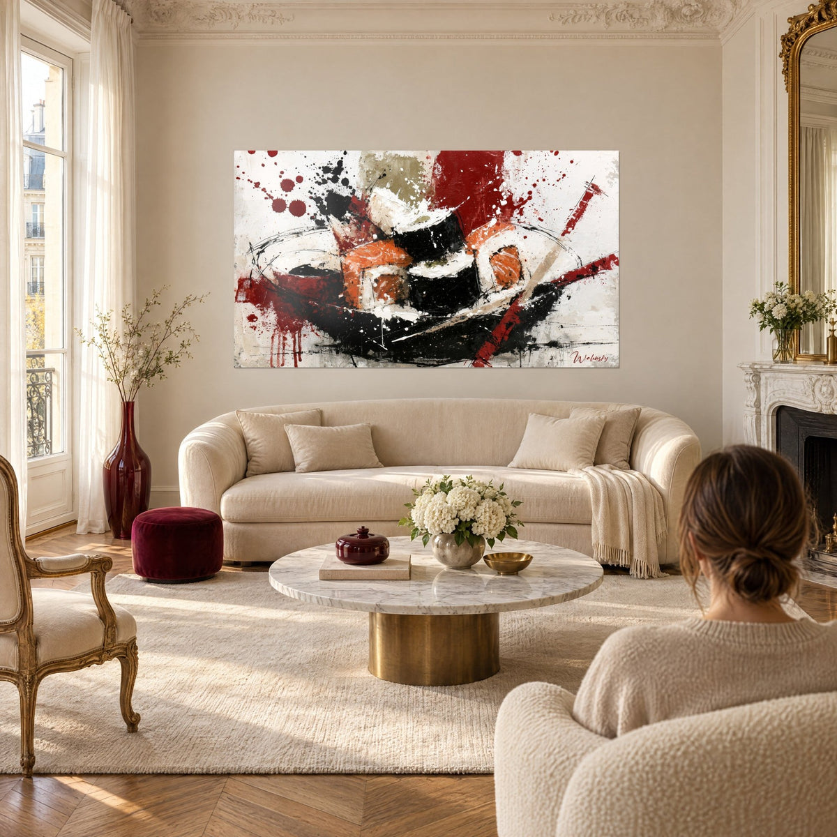 Wall art black and salmon-orange maki with splashes of carmine red and white acrylic, above a sofa in a bright living room