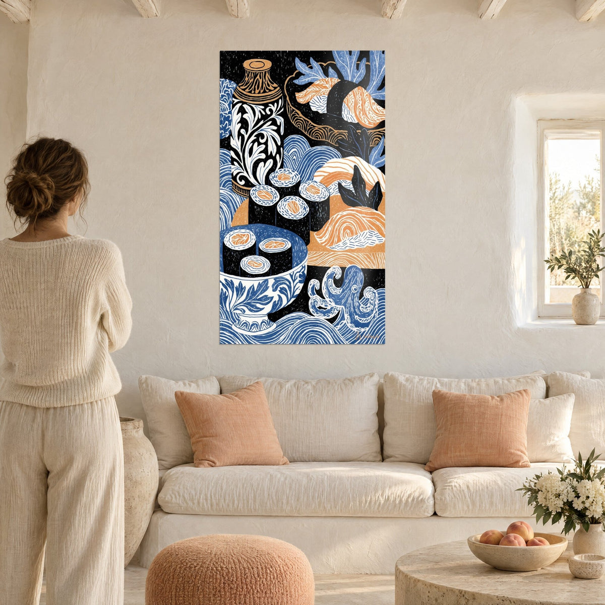 Wall art Blue and white vase with floral patterns, salmon maki and octopus on black background, woman seen from behind, above a sofa in a bright living room