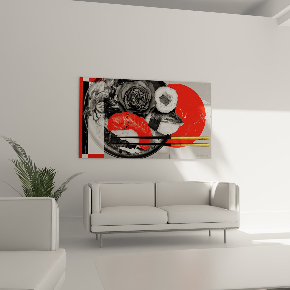 Makis noir et blanc et rose sombre accrochés au-dessus d'un canapé dans un salon lumineux