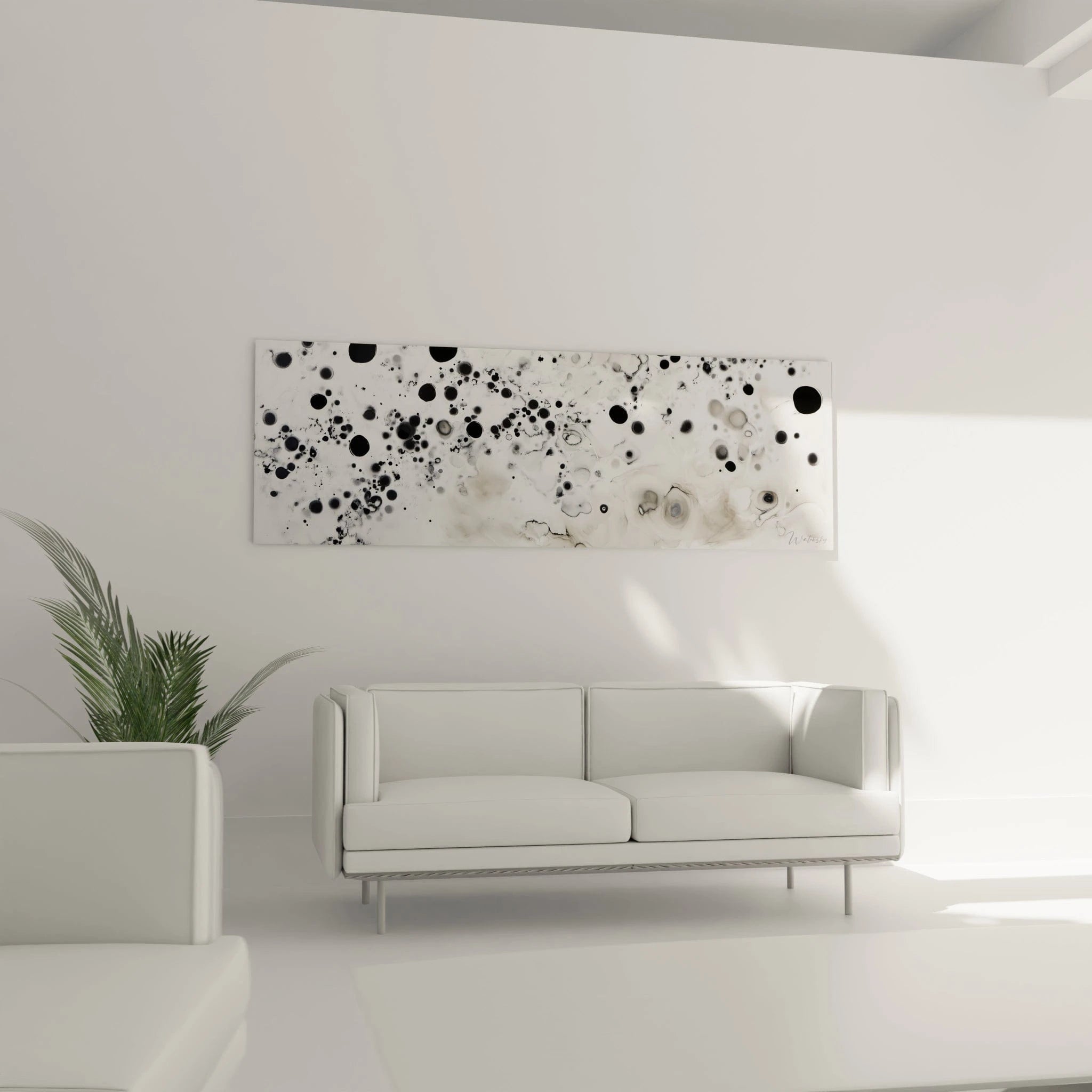 Tableau tacheté noir et blanc de Walensky décorant un salon moderne avec canapé blanc