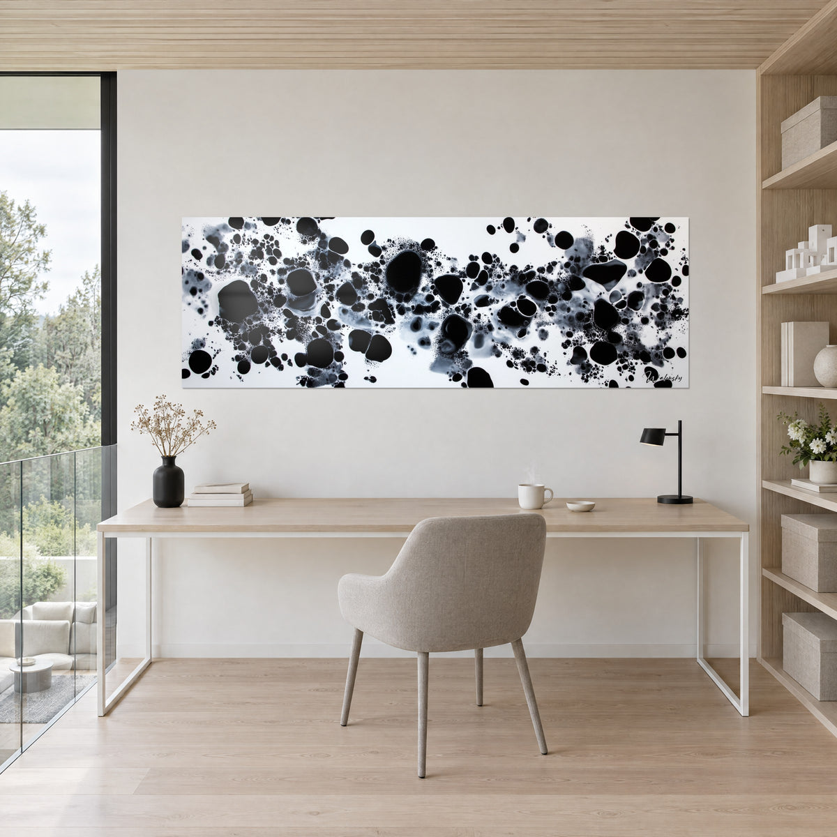 Wall art swarm of black ink drops and silver grey veils on a white background, light wood desk, black lamp, tall shelf