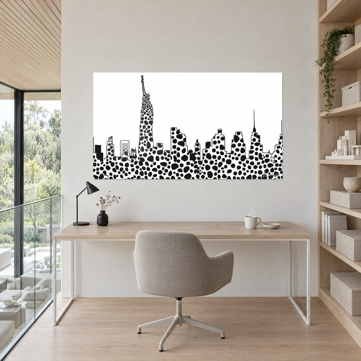 Wall art New York skyscrapers in a black pebble mosaic on white, slender spire to the right, in an office with light wooden shelves