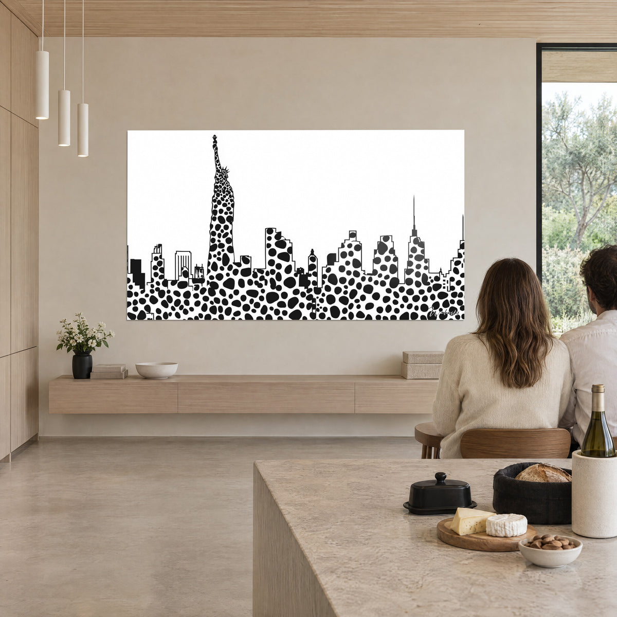 Wall art urban panorama in black dalmatian spots on bright white, towering Statue of Liberty, in an open living room with light wood and beige tones