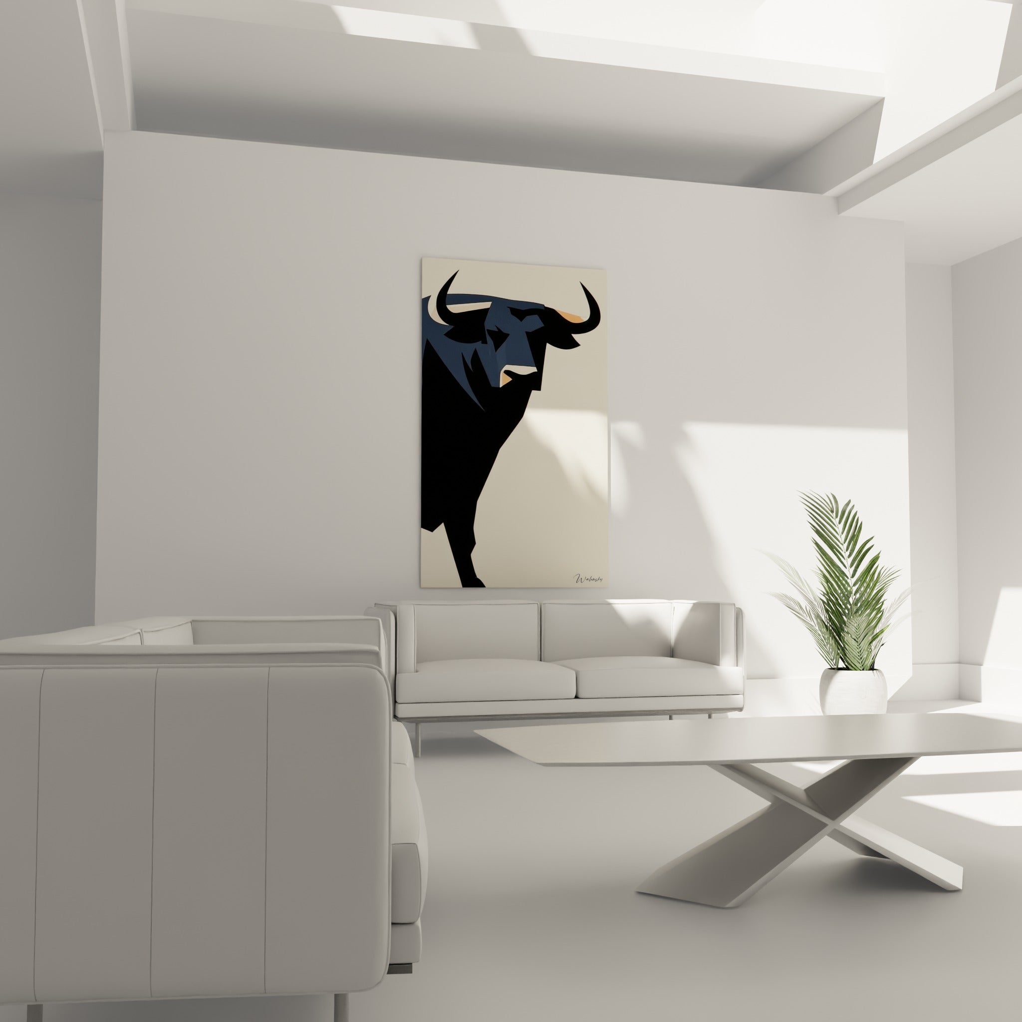 Profil du taureau noir et écru aux touches orange au-dessus d'un canapé dans un salon lumineux