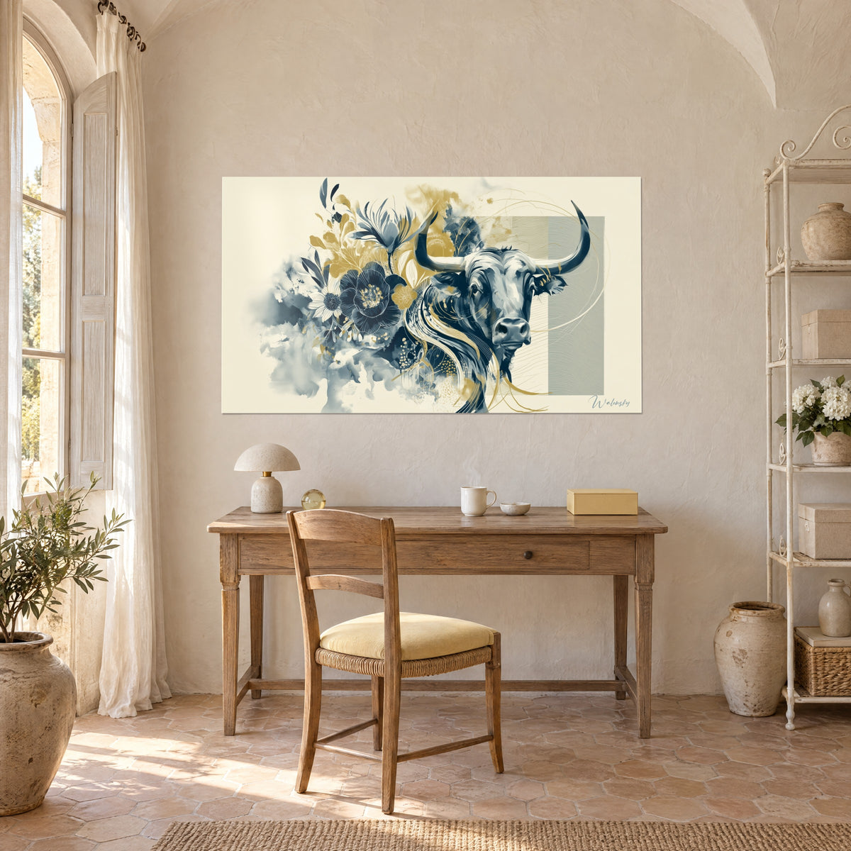 Wall art of a bull silhouette surrounded by dark flowers and bluish washes, scattered gilding, above a wooden desk