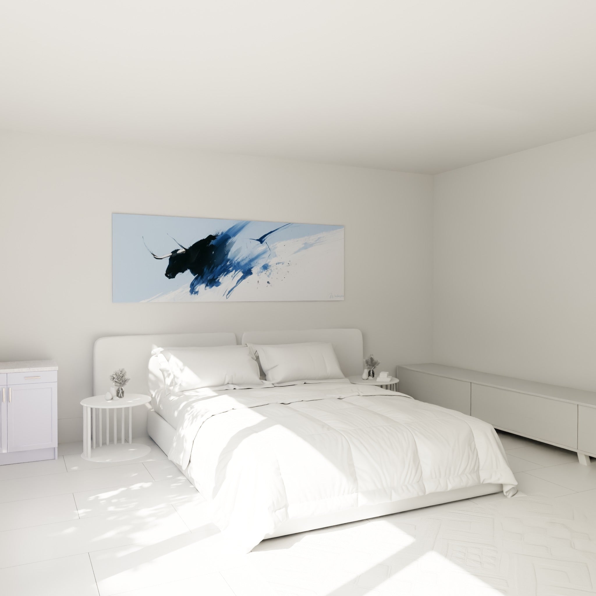 Silhouette de taureau noir et bleu marine accrochée au-dessus d'un lit dans une chambre claire