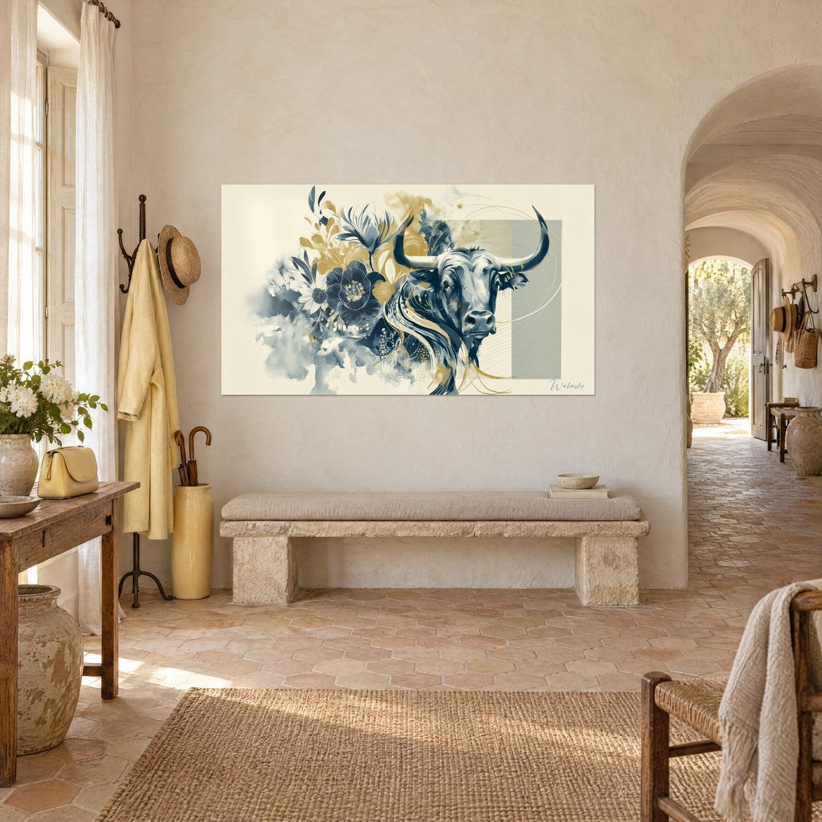 Wall art of a massive buffalo with a calm gaze, indigo peonies, gold touches and a grey-green band, on a cream wall of a Provençal farmhouse
