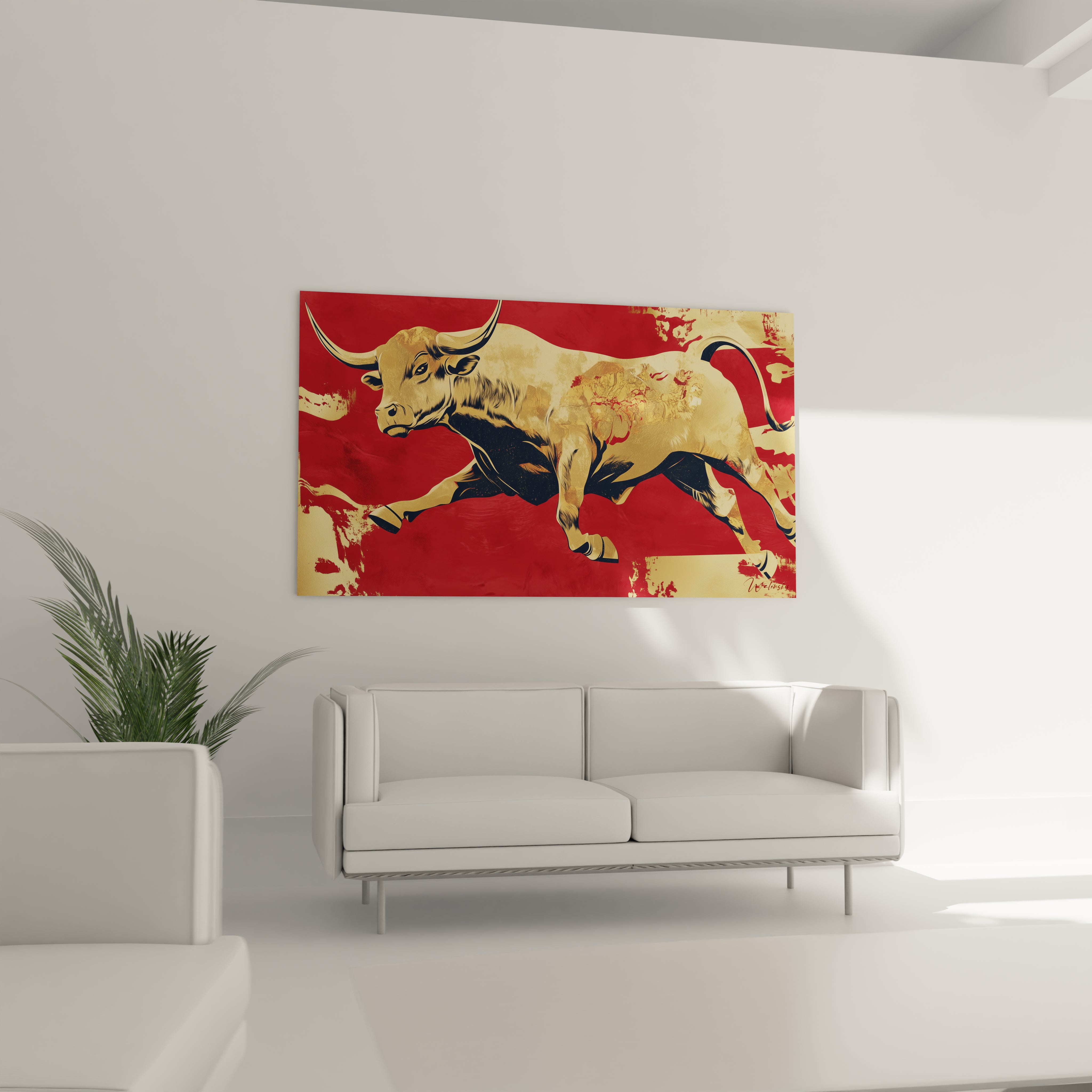 Tableau taureau Walensky doré sur fond rouge accroché au mur d'un salon moderne blanc