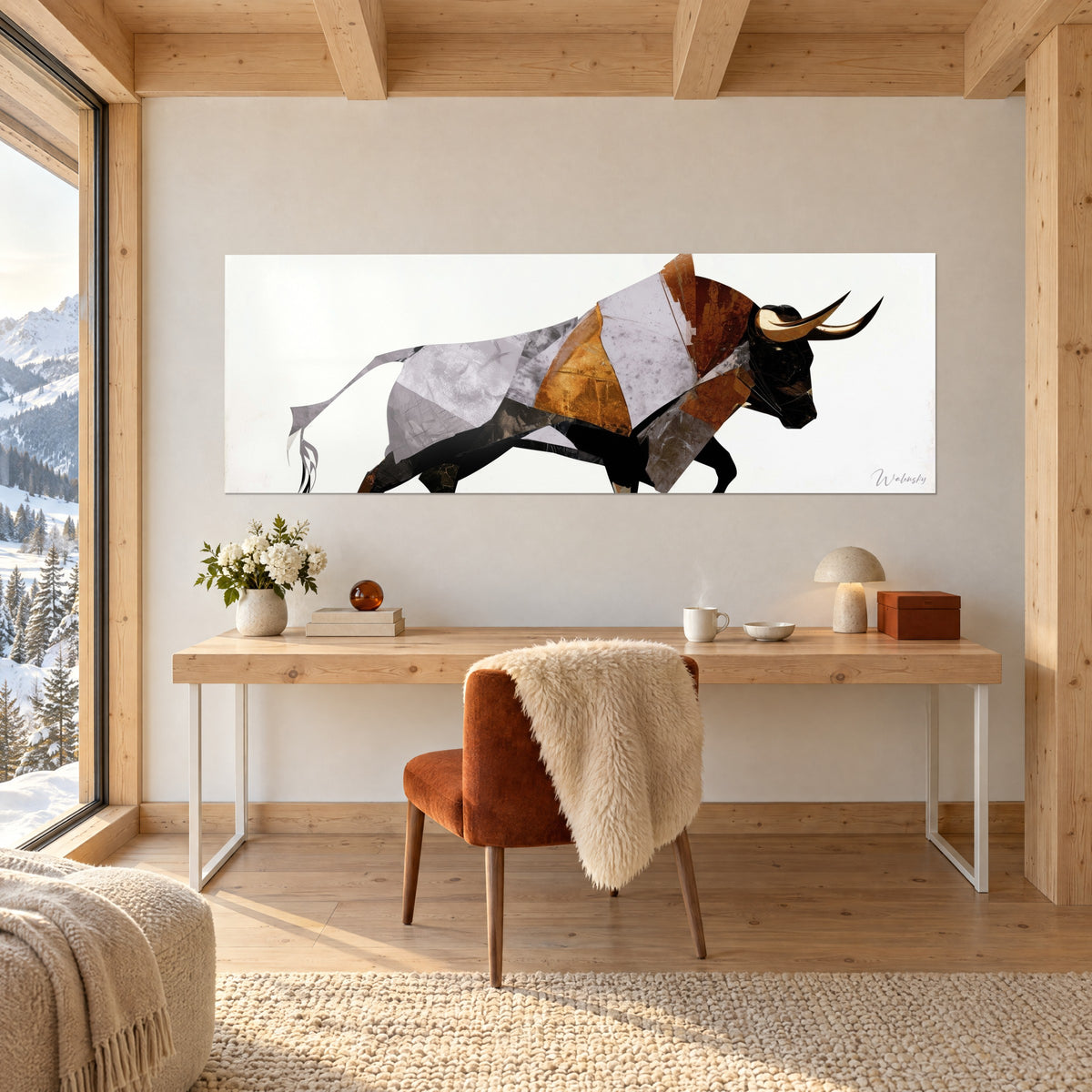 Tableau bovin stylisé aux fragments gris et orangés, corps noir au galop, accroché au-dessus d'un bureau en bois clair, chalet