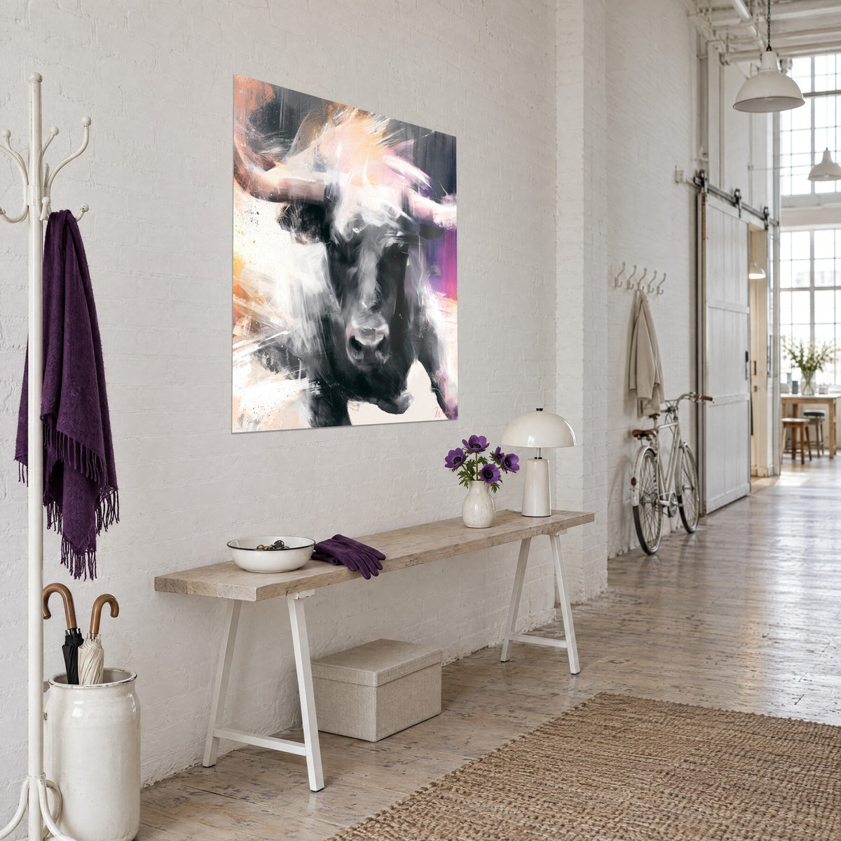 Wall art Massive bovine with pearl grey muzzle, orange and violet background, three-quarter view beside a light wood console