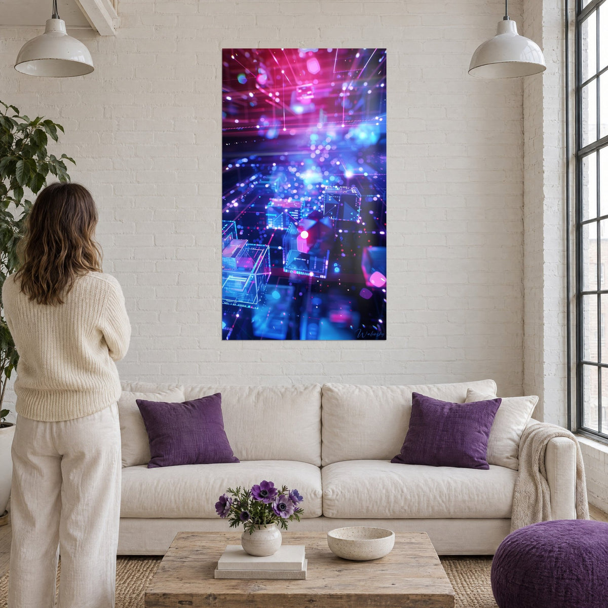 Wall art of holographic cubes floating in a pink and blue glow, woman from behind, above a sofa in a bright living room