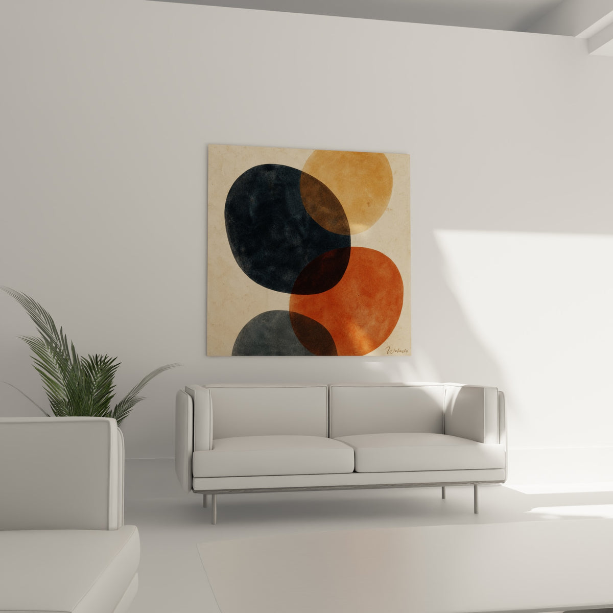 Cercles roux et anthracite du tableau Terracotta disposés au-dessus d'un canapé dans un salon lumineux