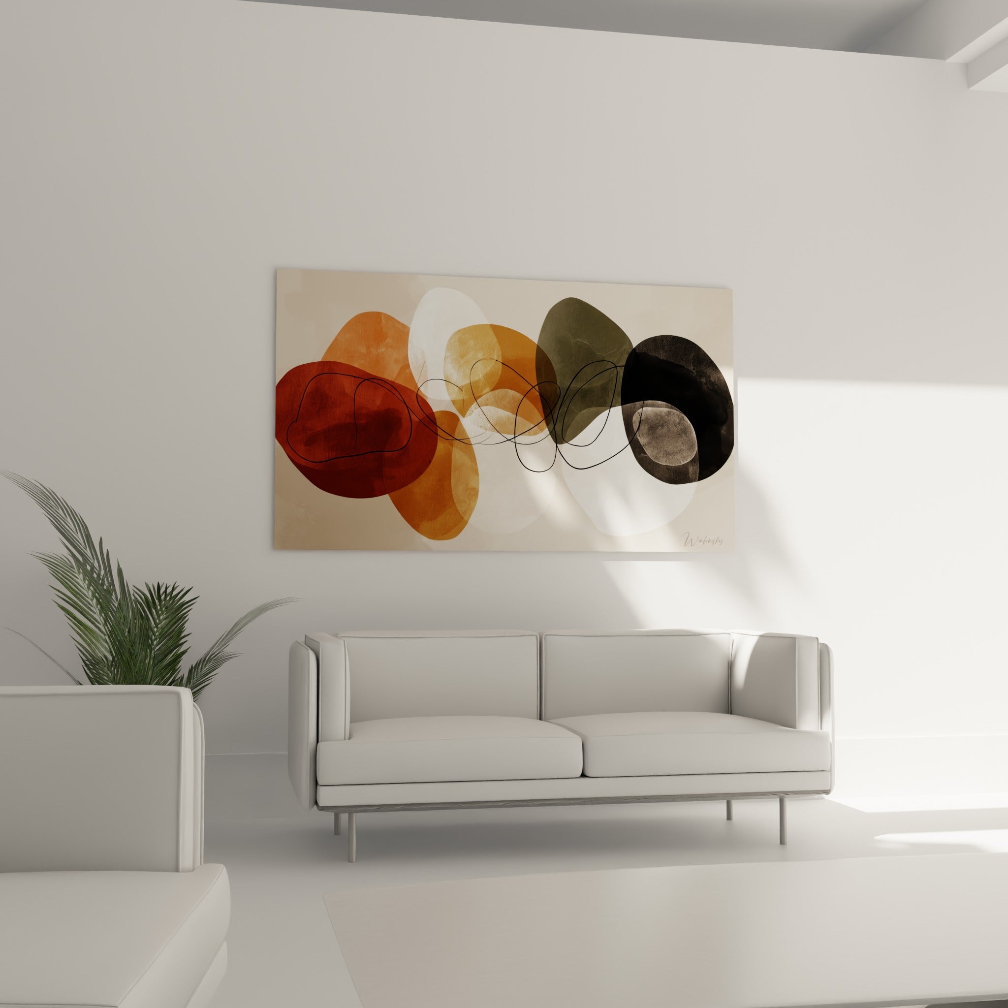 Ovales anthracite et brun rouille superposés au-dessus d'un canapé dans un salon lumineux