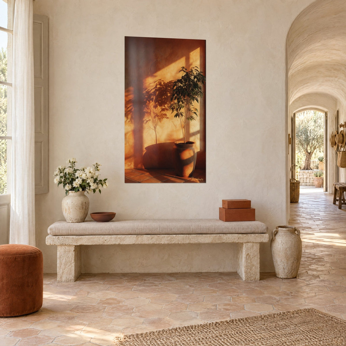 Wall art shrub in a terracotta pot, golden light and brown shadows on rough plaster, facing a vaulted hallway of a Provençal farmhouse
