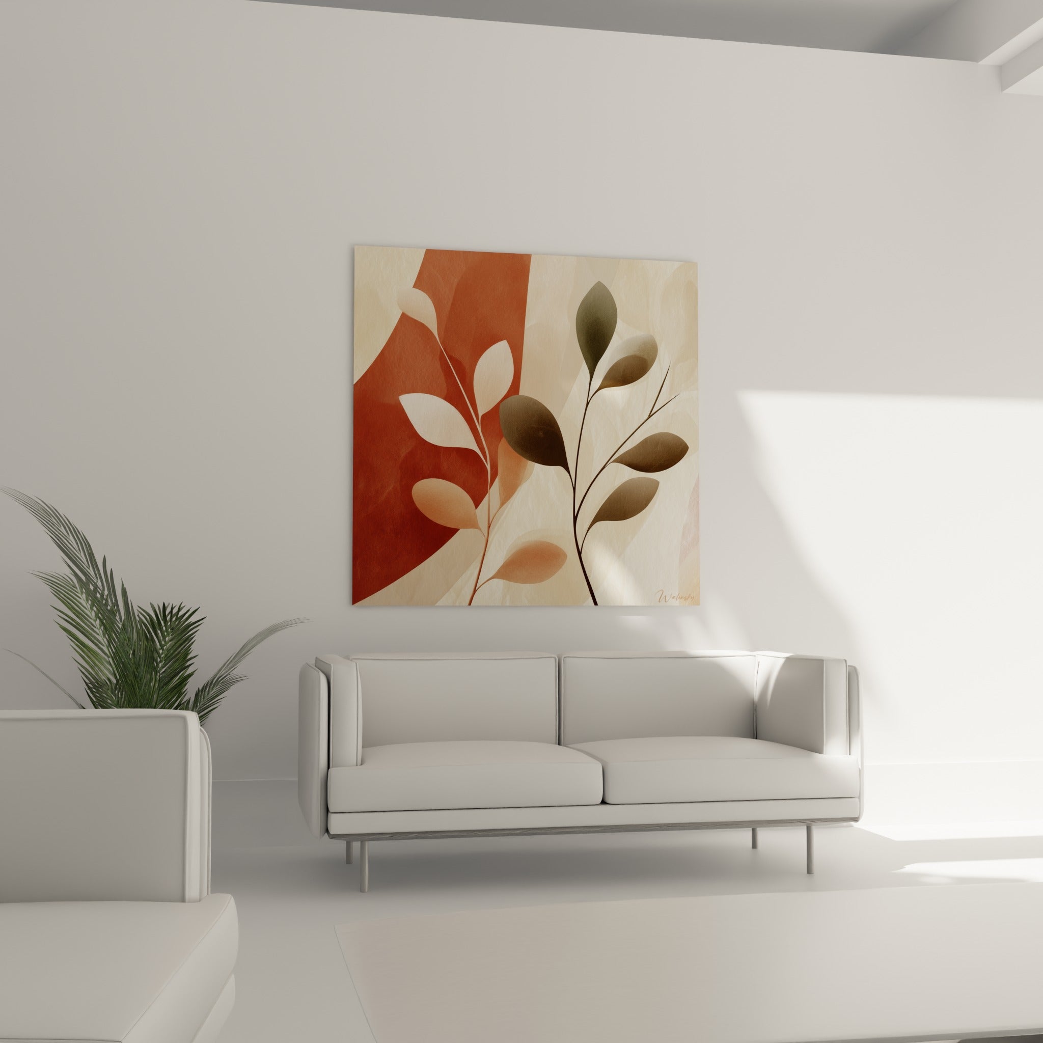Tiges fines aux feuilles terracotta et olive foncé, disposées au-dessus d'un canapé dans un salon lumineux