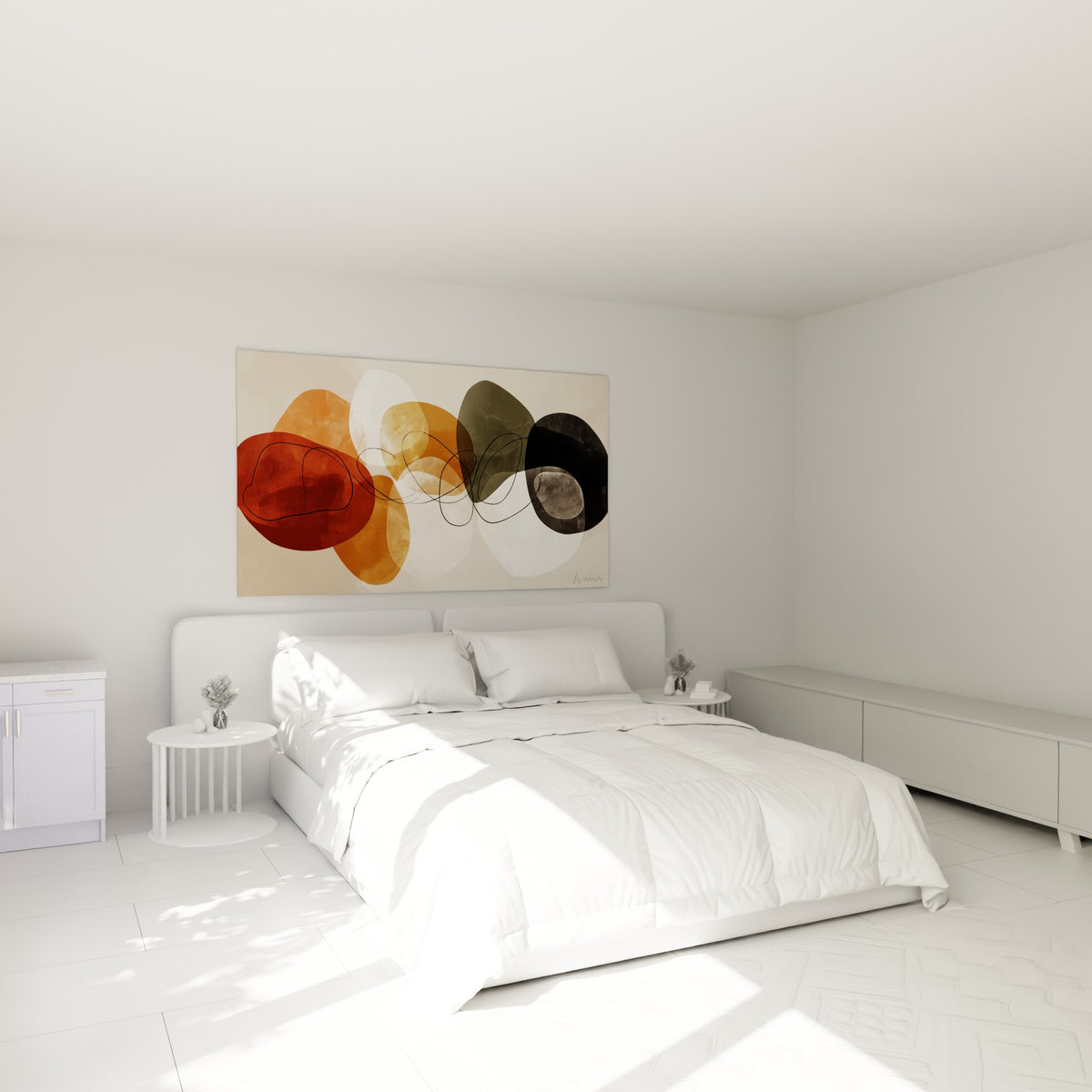 Galets abstraits terracotta et ocre accrochés au-dessus d'un lit dans une chambre claire
