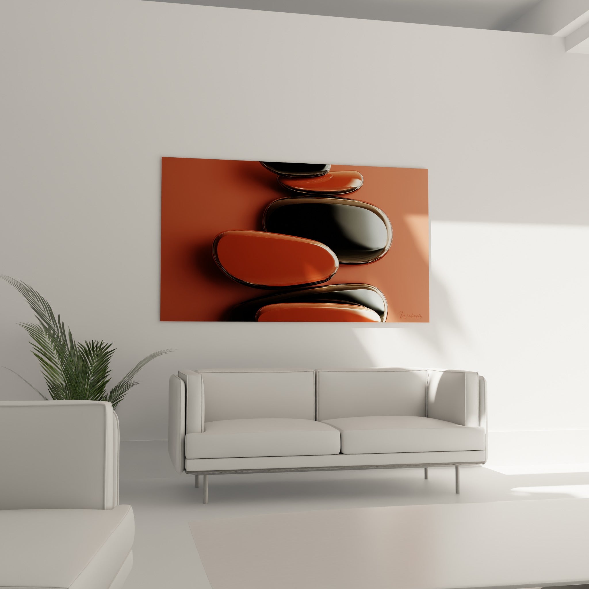 Formes minérales terracotta et anthracite au-dessus d'un canapé dans un salon lumineux