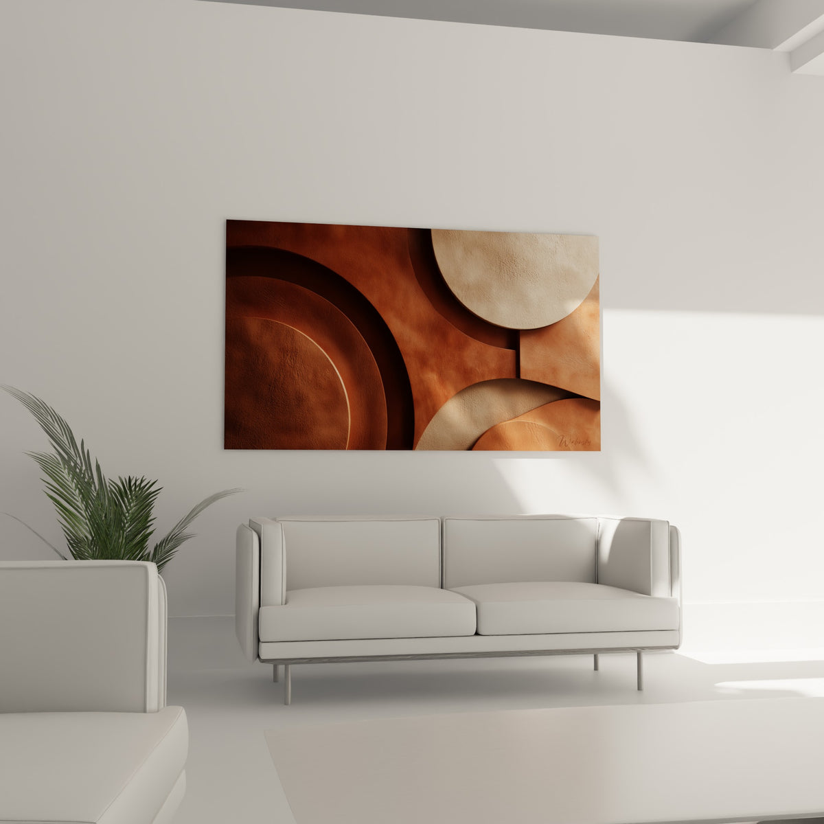 Formes rondes ocre et sable aux reliefs marqués, disposées au-dessus d'un canapé dans un salon lumineux
