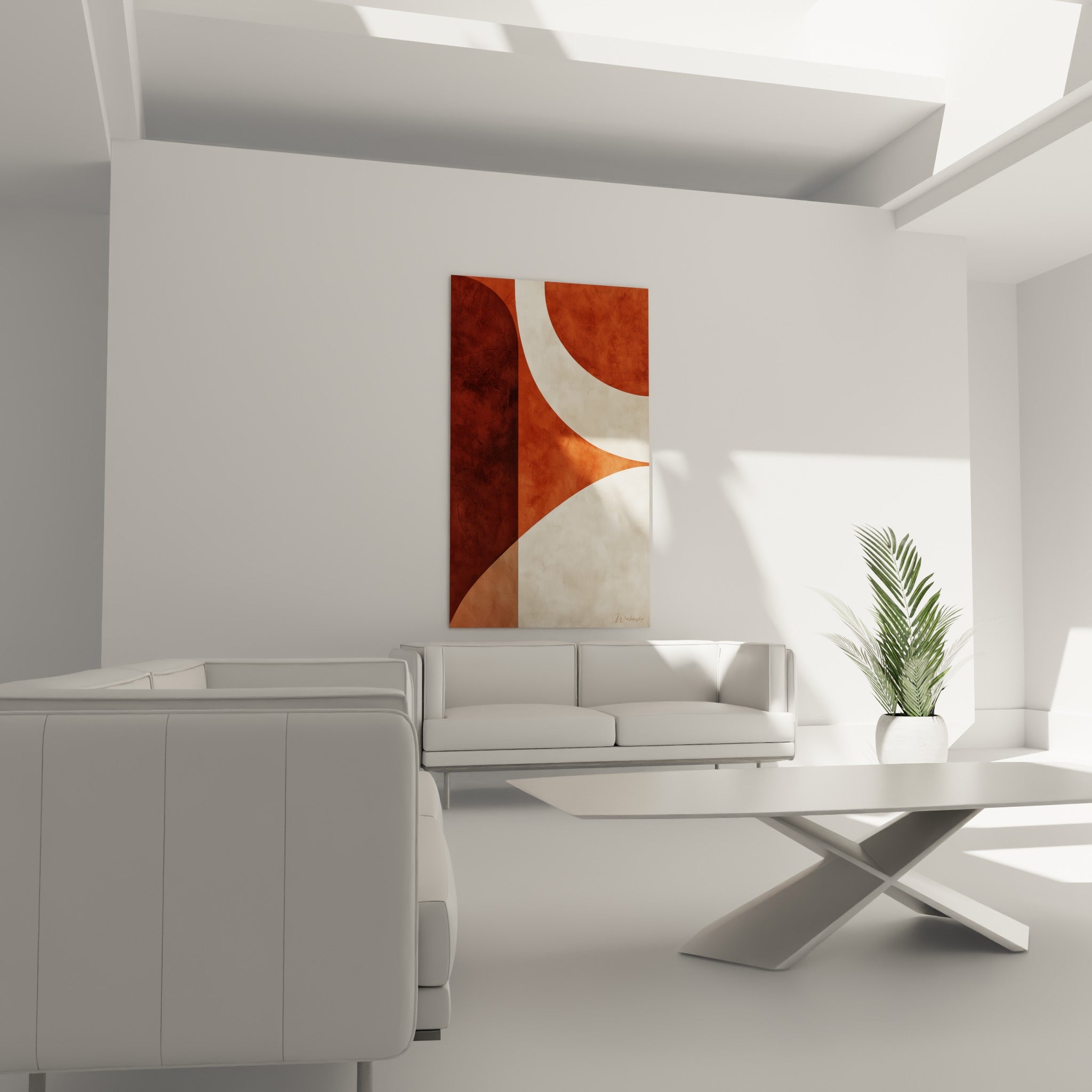Formes rondes terracotta et crème accrochées au-dessus d'un canapé dans un salon lumineux et minéral