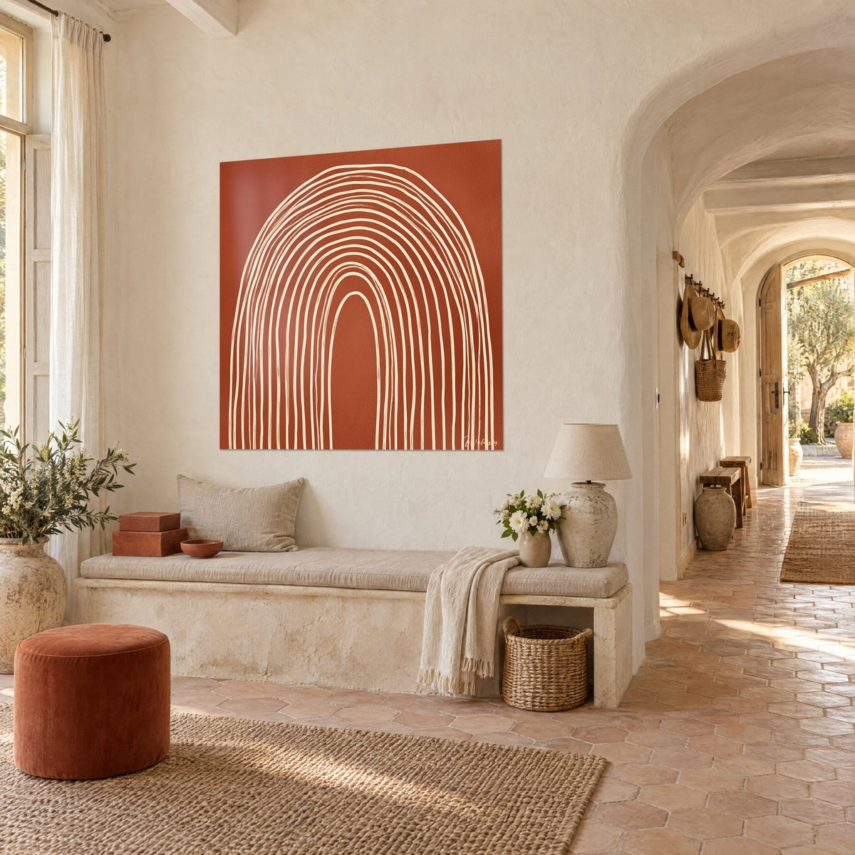 Wall art with nested ivory half-circles on terracotta, irregular line, hung near a stone vault and a bench in the farmhouse