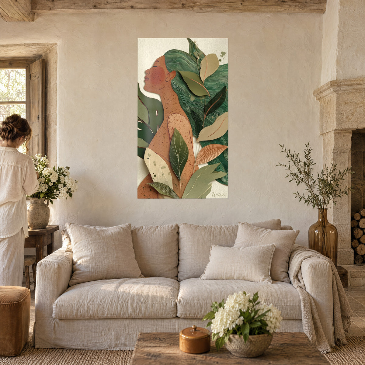 Wall art woman in raised profile with eyes closed, freckled terracotta skin, sage green hair, above a sofa in a bright living room