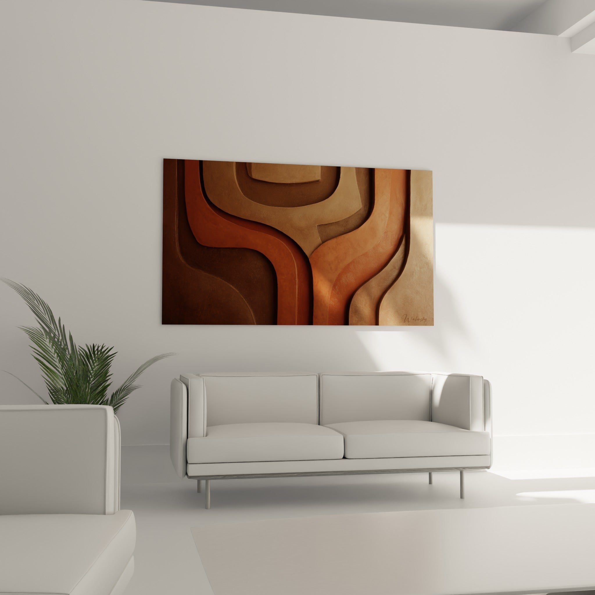 Composition sculptée terracotta et anthracite disposée au-dessus d'un canapé dans un salon lumineux