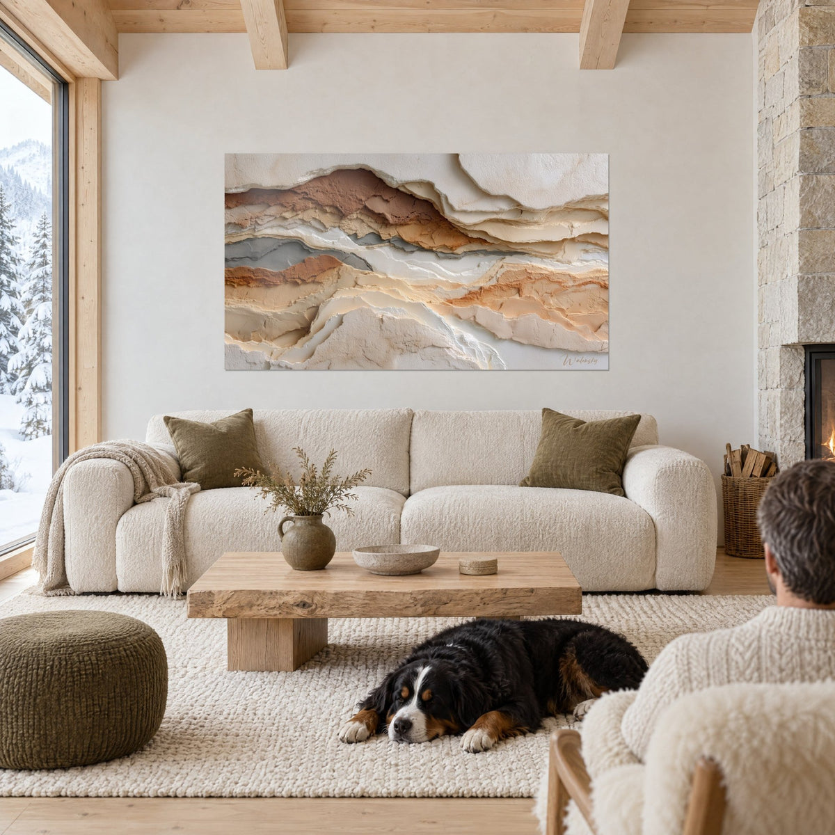 Wall art stratified cliff in crumpled white and amber folds, grey layer, a black dog lying on a sofa in a bright living room