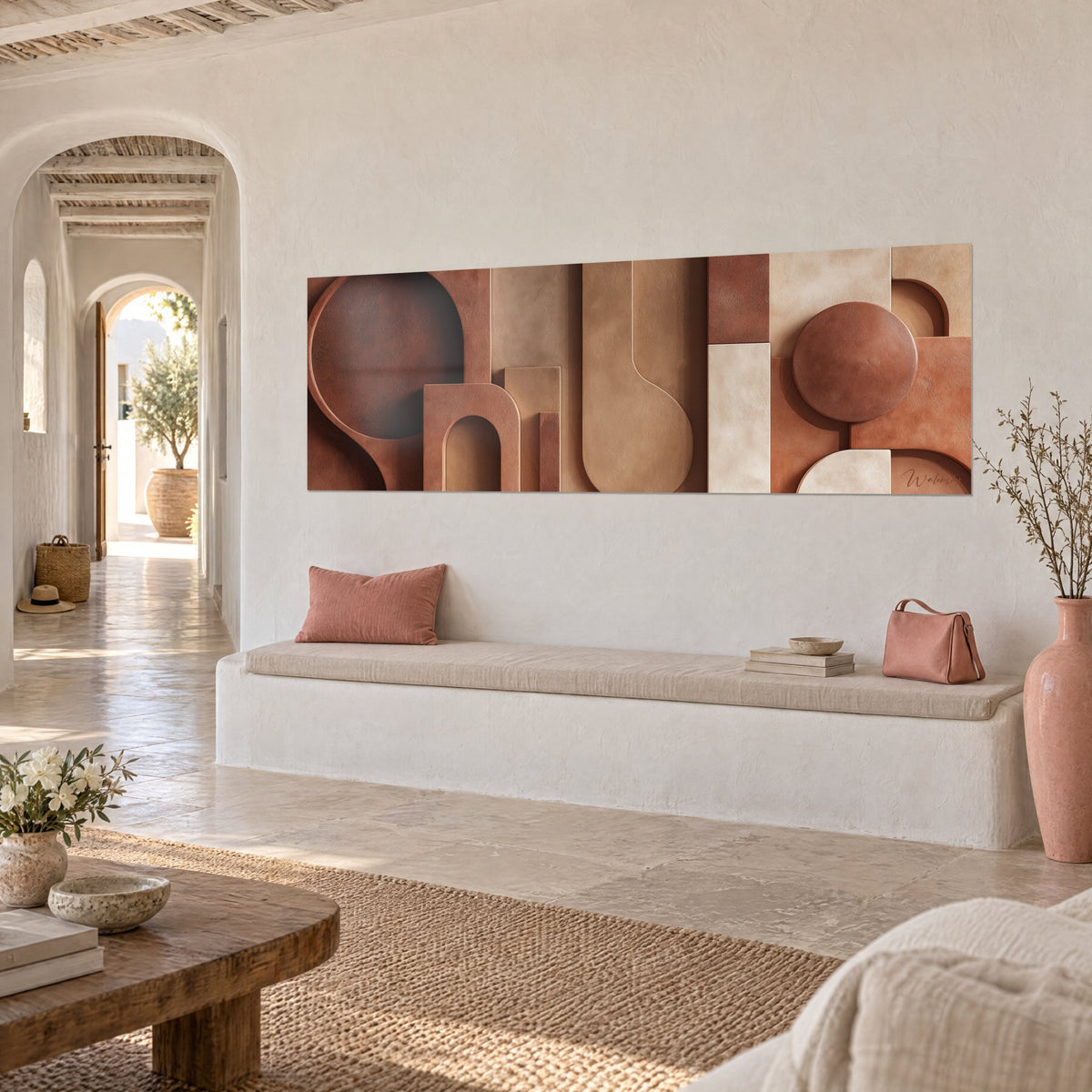 Wall art abstract bas-relief in terracotta and ivory, arches and a circle in volume, hung above a light stone bench