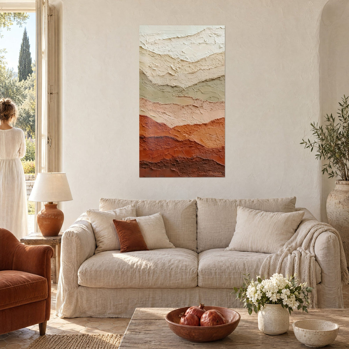 Wall art with thick textured mineral layers in ivory and terracotta, sage green stripe, hung above a sofa in a bright living room