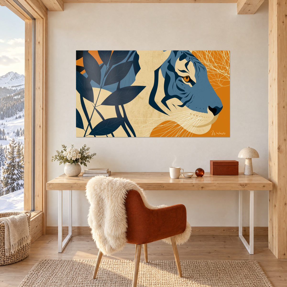 Graphic wall art of a tiger in blue and ochre with fine white whiskers, hanging above a wooden desk by the window