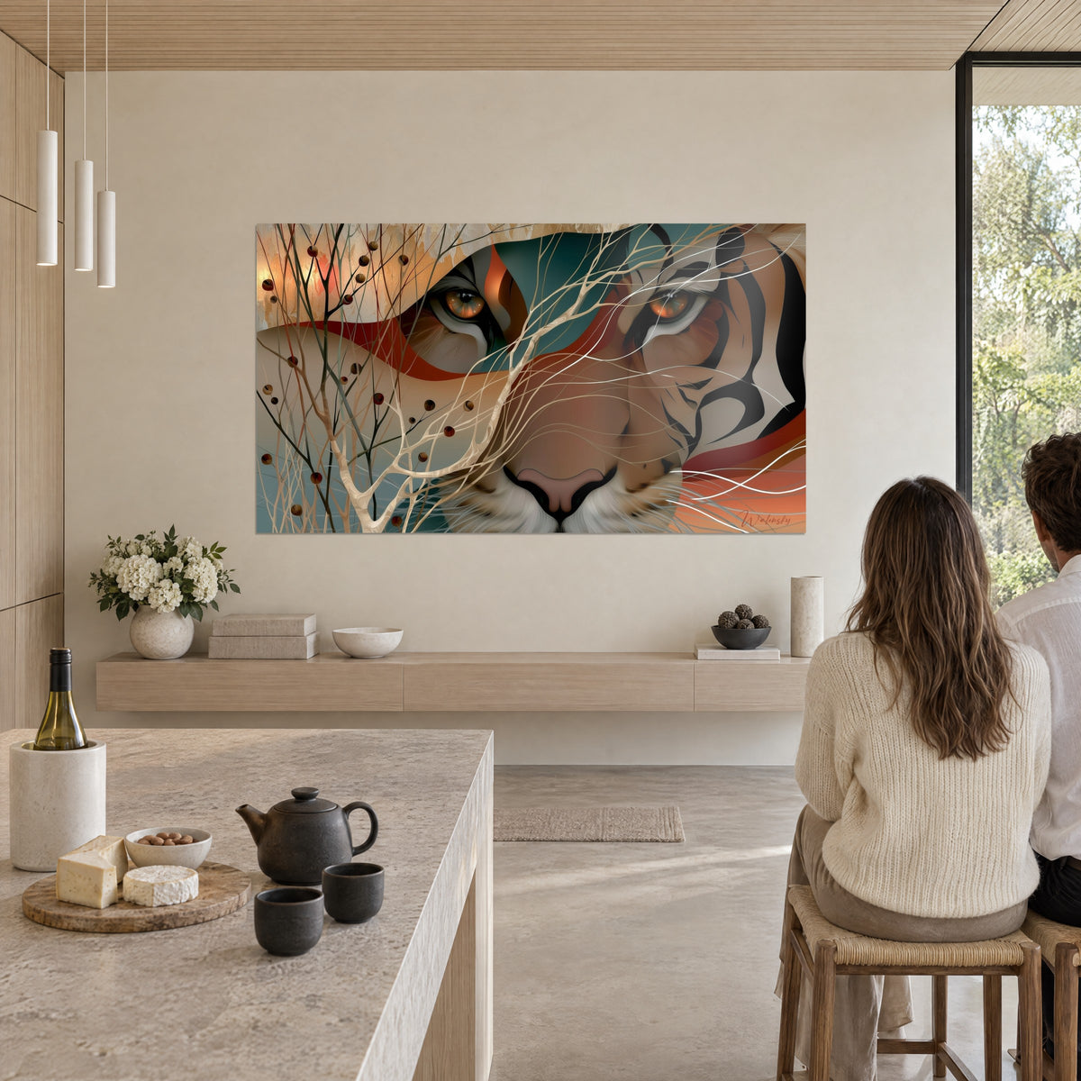 Wall art stylised tiger face, teal and rust waves, pale branches, on a white wall in the open-plan kitchen