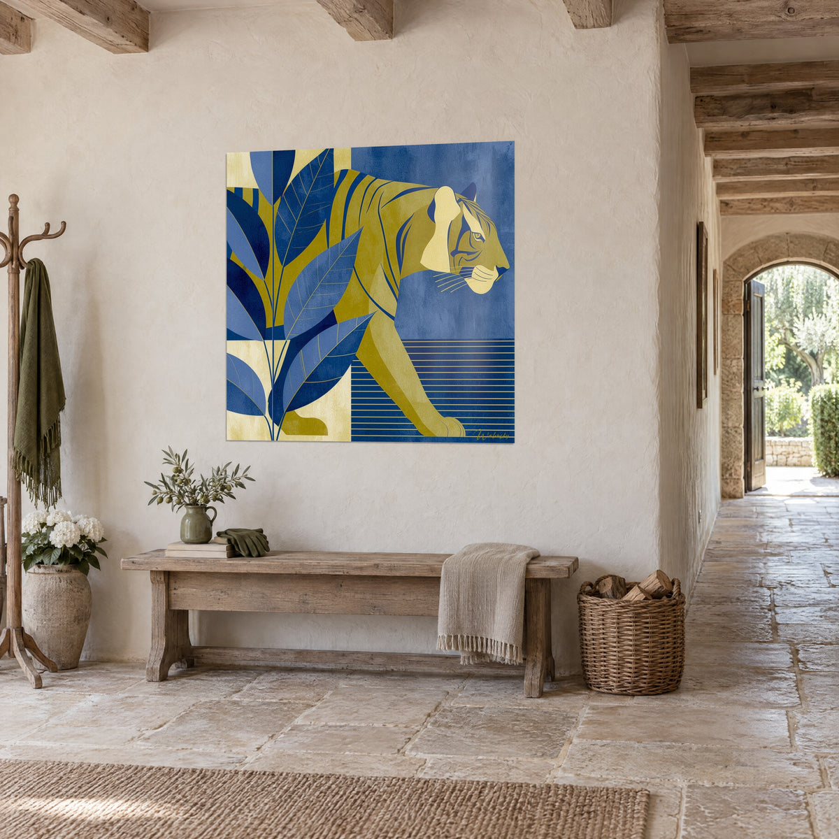Wall art of a golden tiger with indigo stripes, olive coat and horizontal blue bands, hung in a corridor with light stone walls