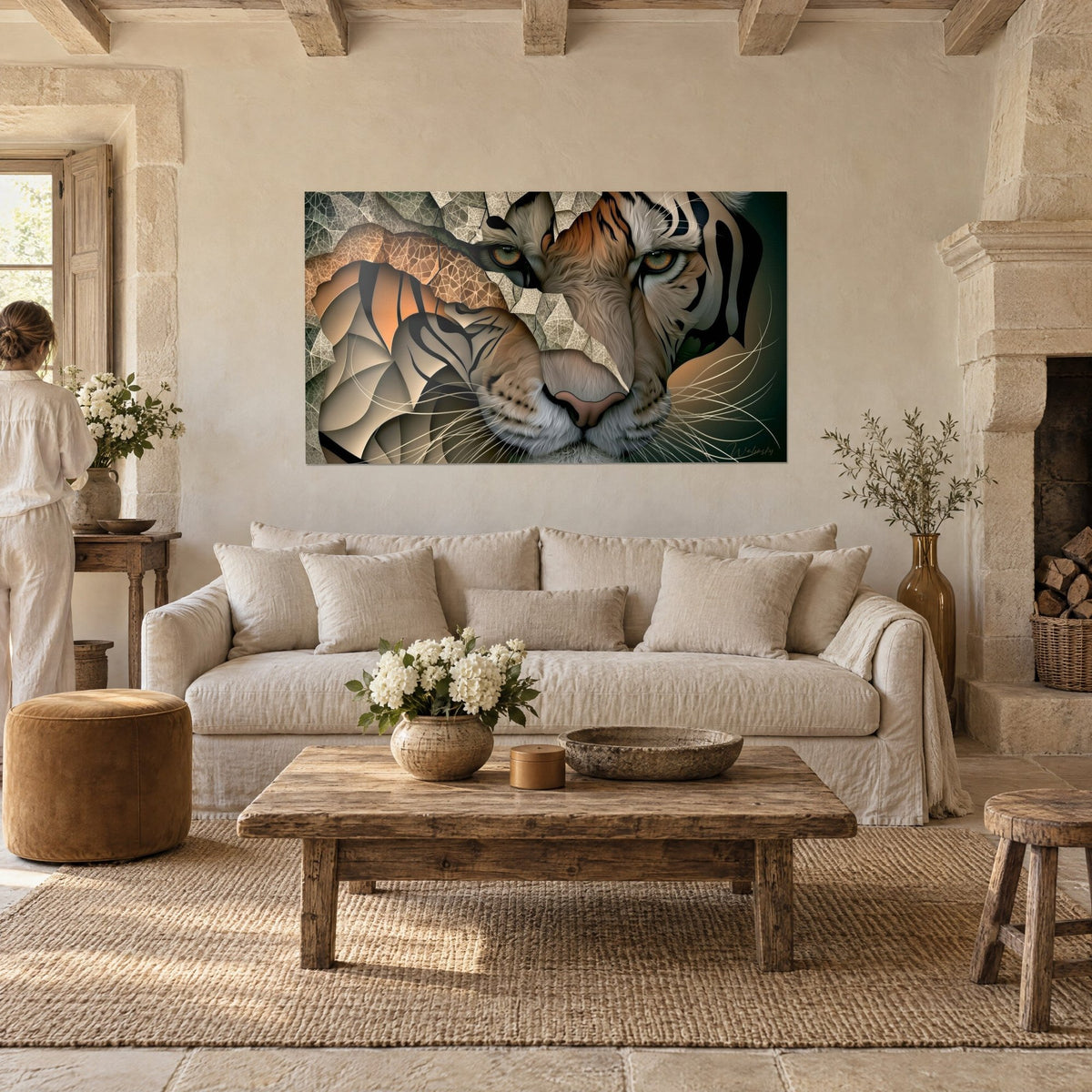 Wall art striped tiger with amber eyes, ochre and charcoal fragments, person seen from behind, above a sofa in a bright living room