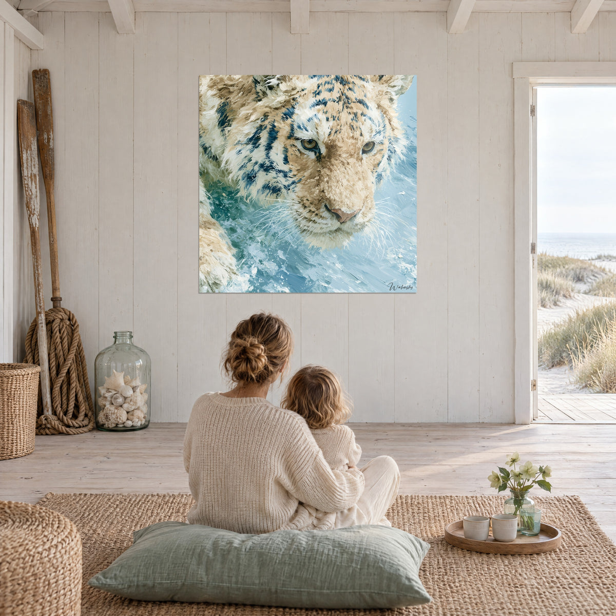 Tableau portrait de tigre blanc, rayures bleu marine et eau bleu givré, accroché dans une salle claire face à la mer