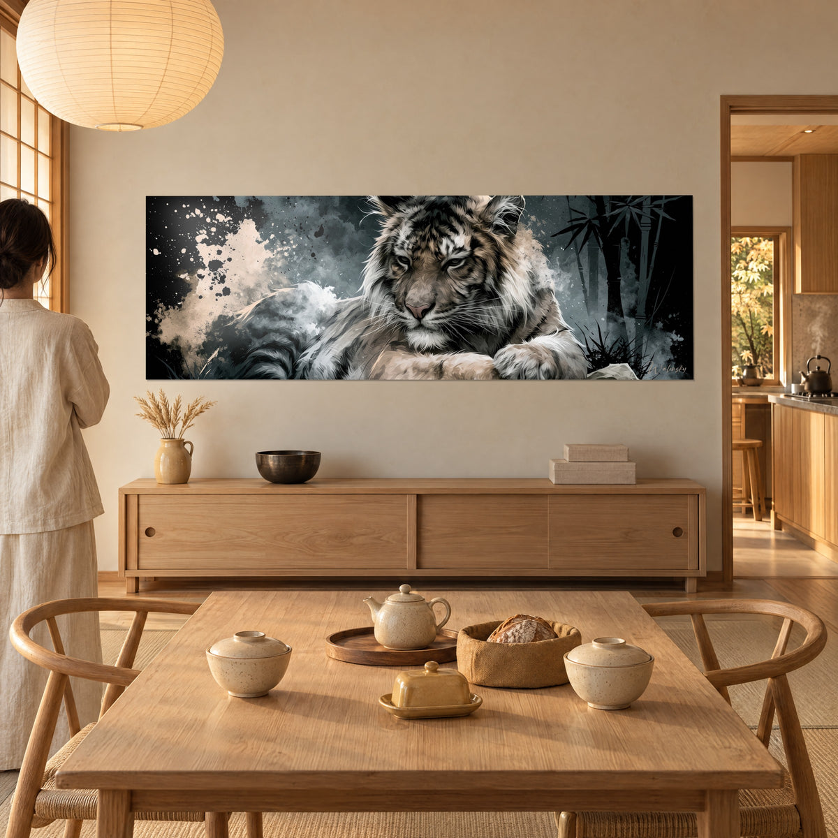 Wall art portrait of a white and tawny tiger, paw resting, cream splashes, above a light wood sideboard beside a set dining table