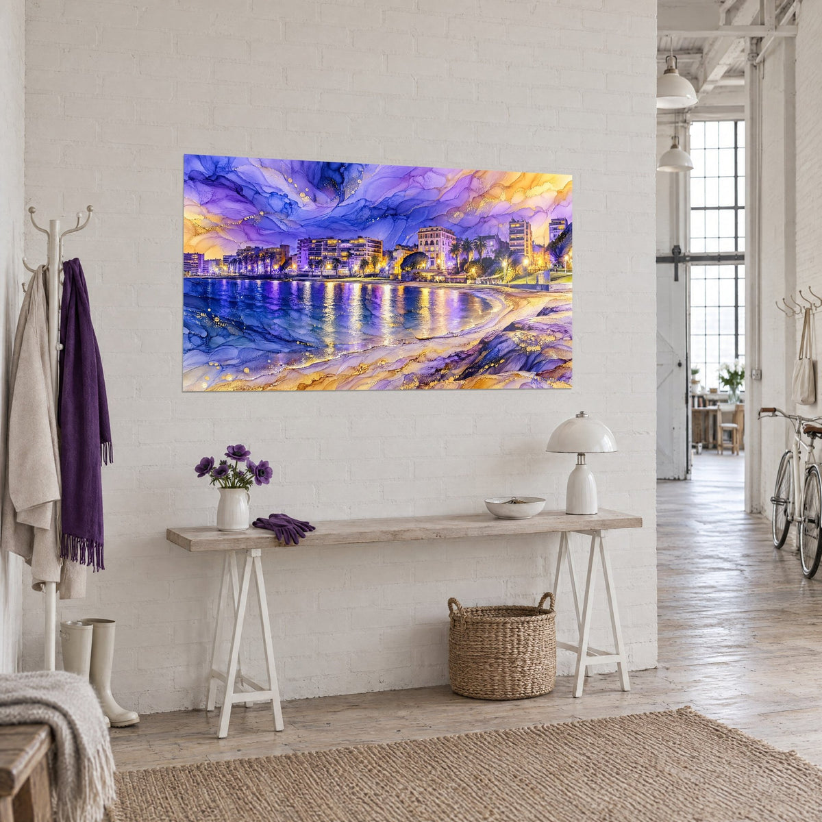 Wall art crescent beach under an indigo and gold sky, palm trees and lit facades, three-quarter view above a loft console