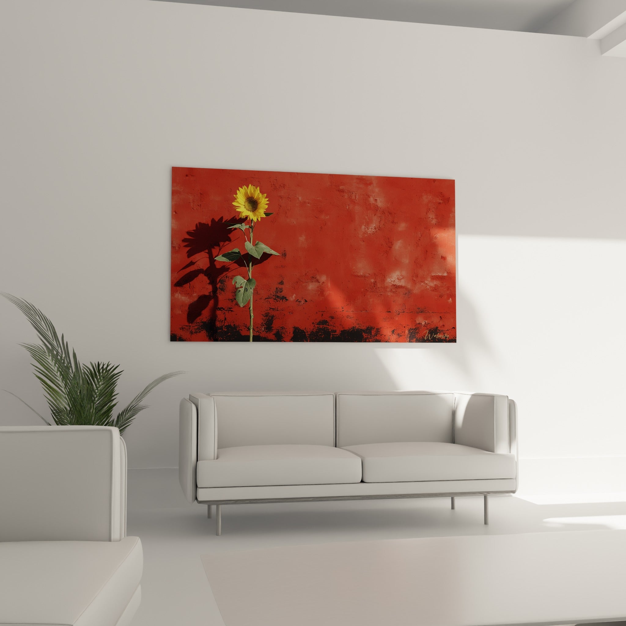 Corolle dorée et feuillage vert sauge sur fond terracotta au-dessus d'un canapé dans un salon lumineux