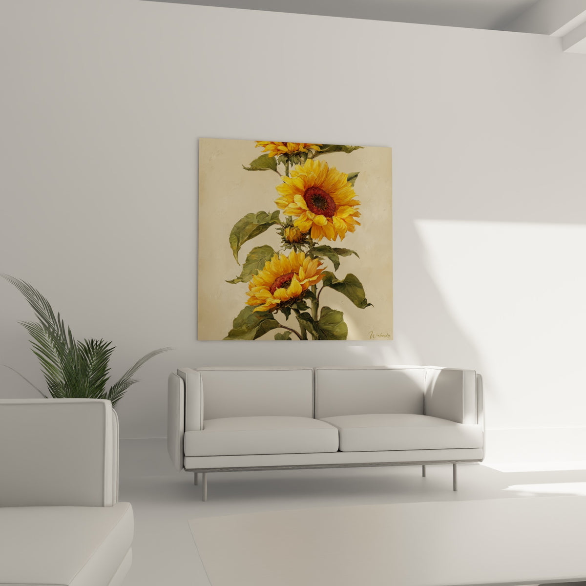 Tige de tournesols orangés et feuillage vert olive suspendue au-dessus d'un canapé dans un salon lumineux