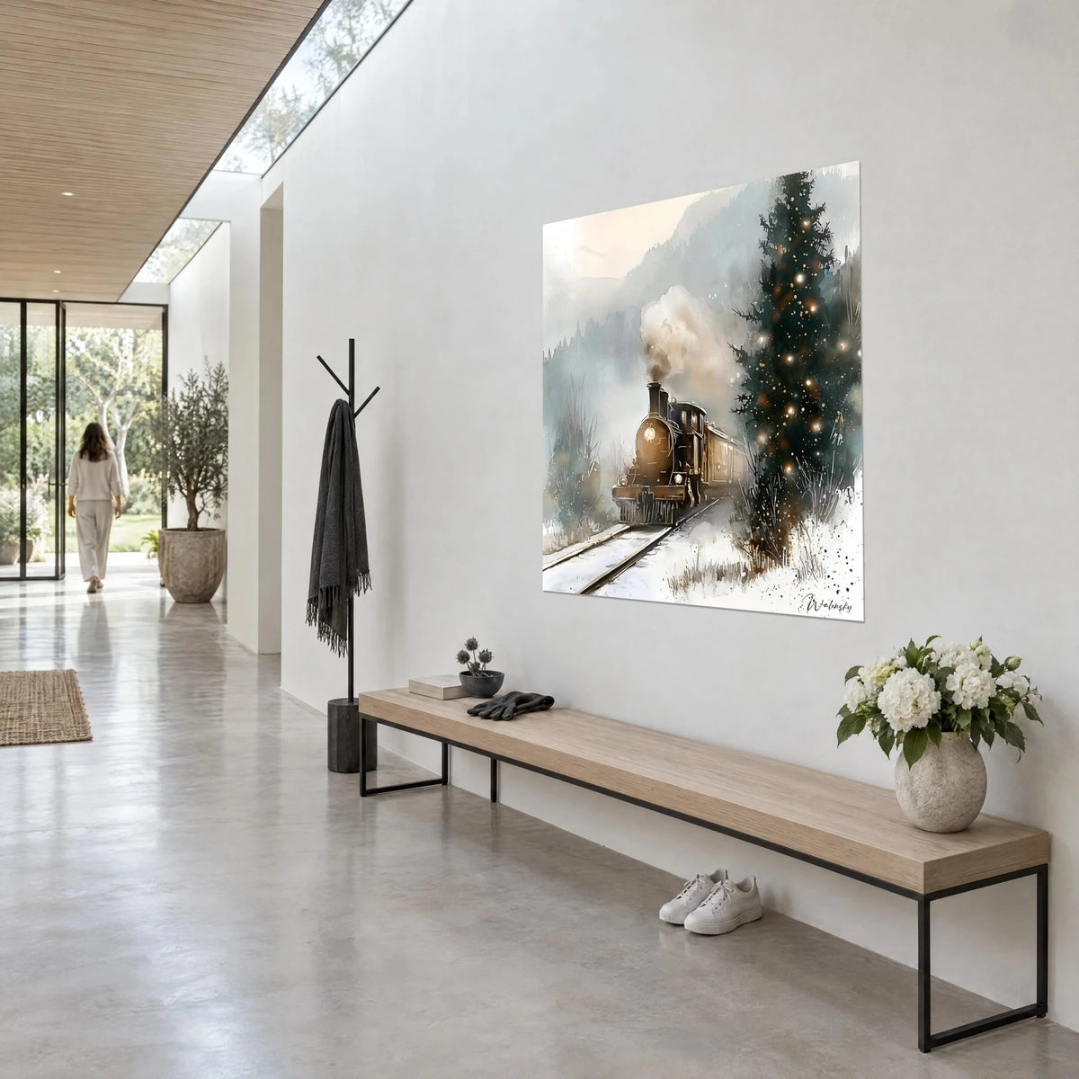 Wall art old train emerging from blue-grey mist, dark green fir tree dotted with golden lights, three-quarter view in a bright hallway