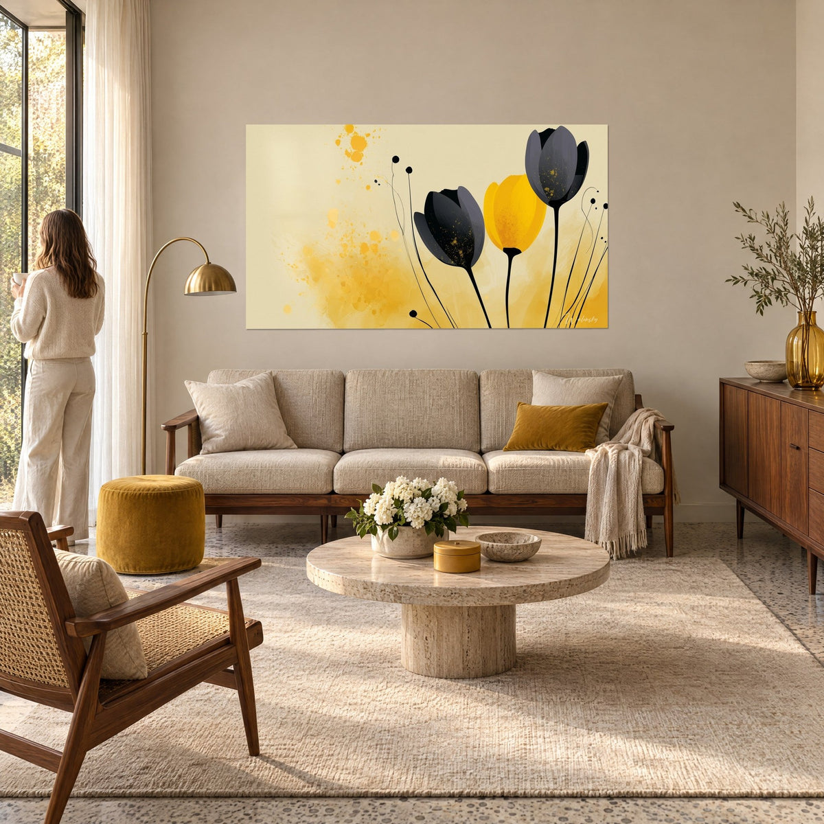Wall art black and golden-yellow tulips with thread-thin stems, saffron splashes, above a sofa in a bright living room