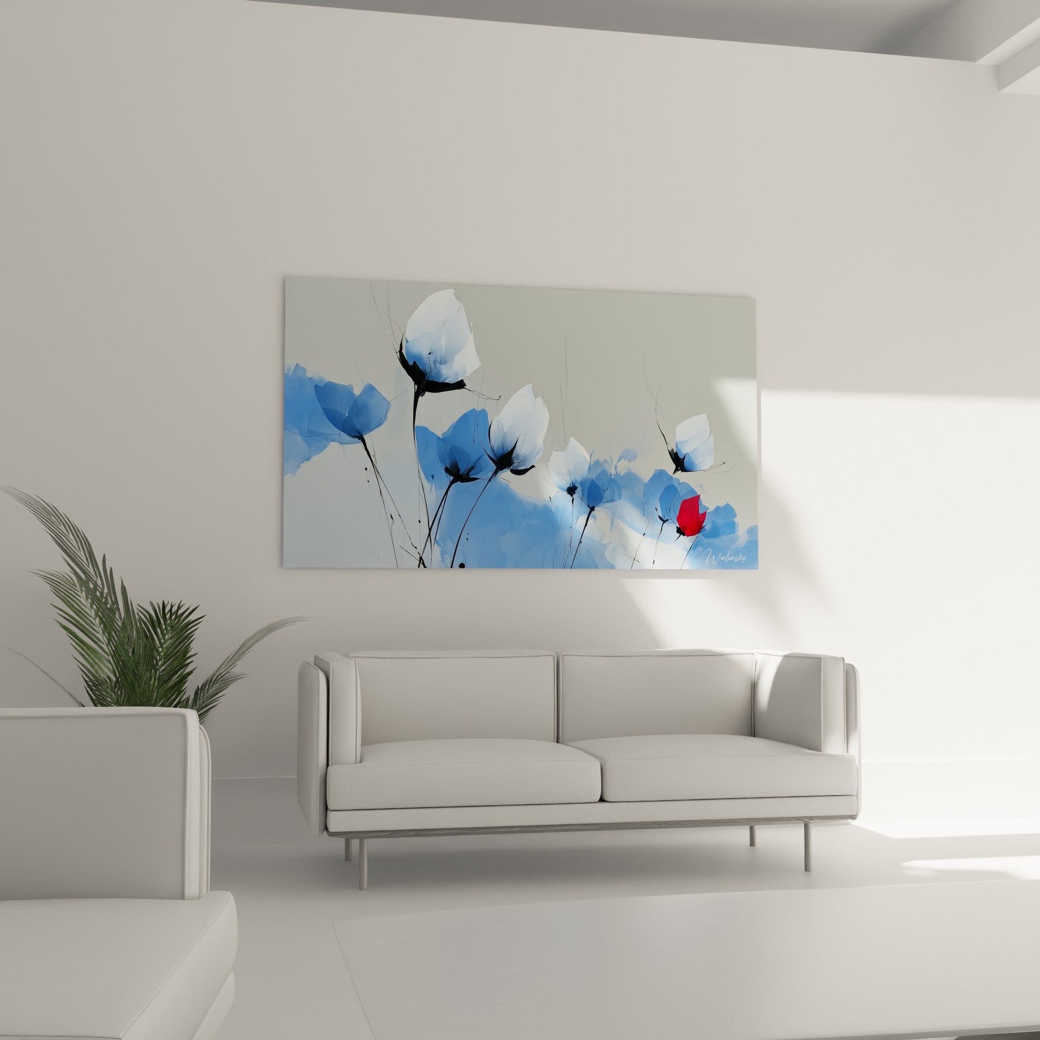 Tulipes blanches et bleu marine composent ce tableau, suspendu au-dessus d'un canapé dans un salon lumineux