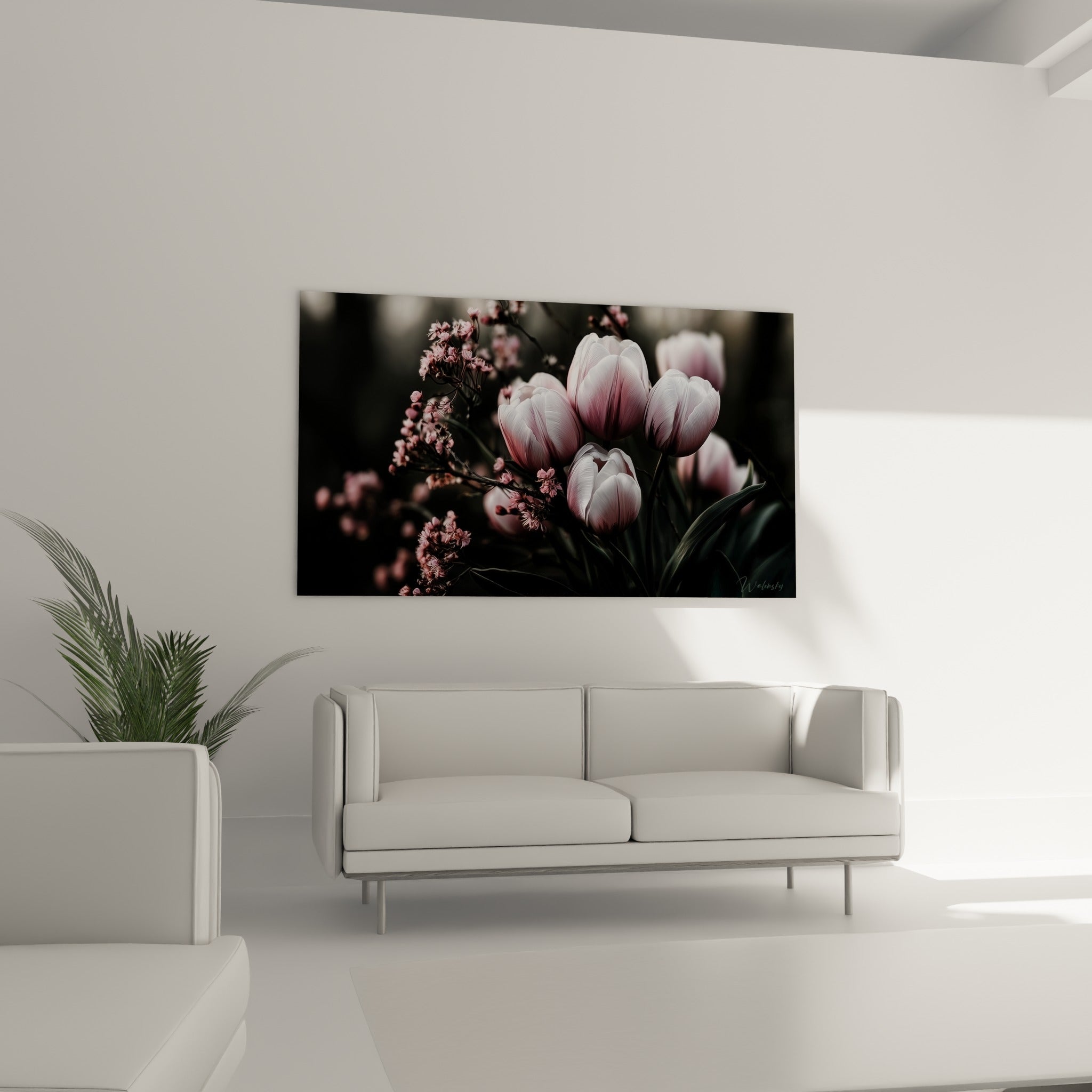 Pétales de tulipes roses et blanches disposés au-dessus d'un canapé dans un salon lumineux