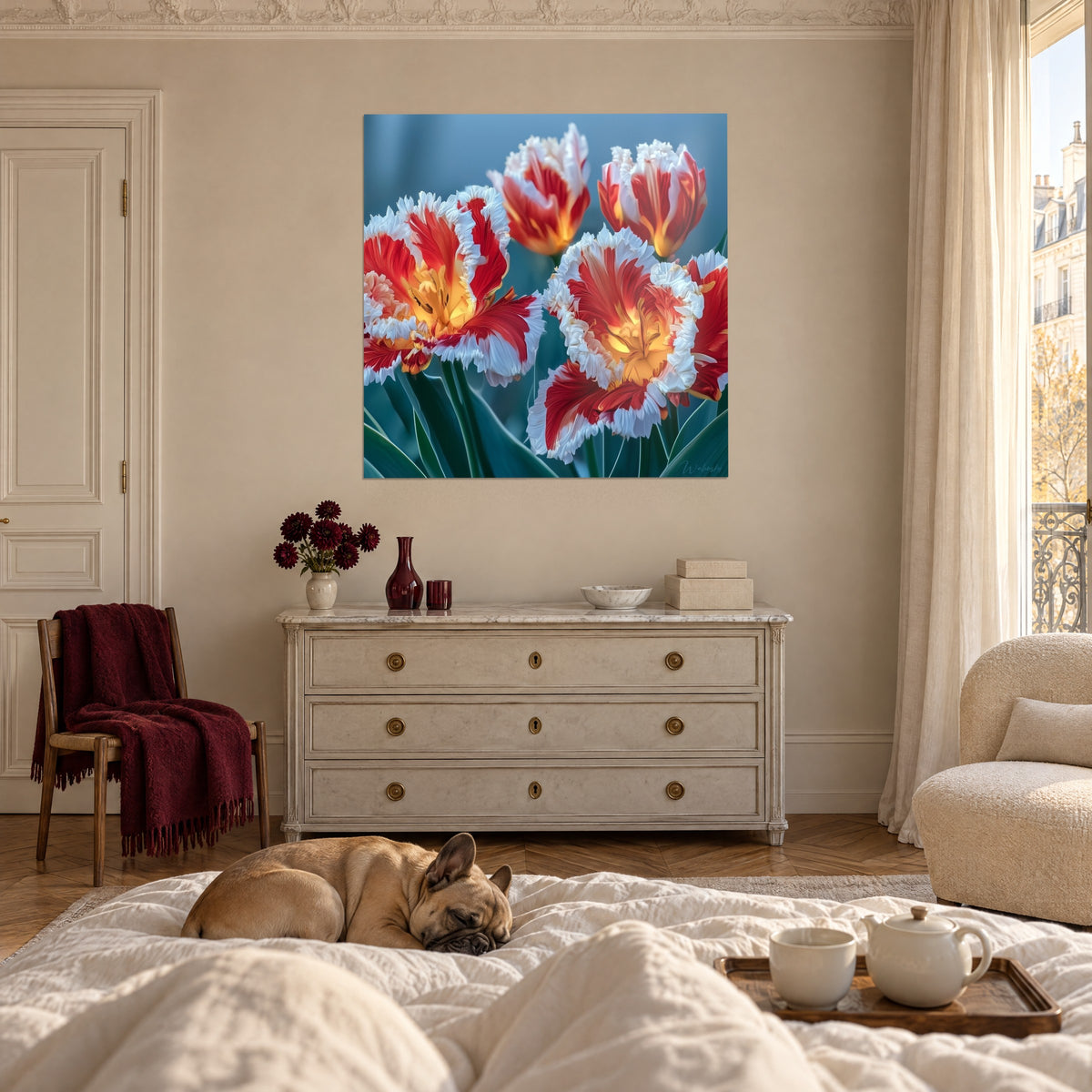Wall art with scarlet blooms edged in white lace and a golden heart, above a bed in a light bedroom