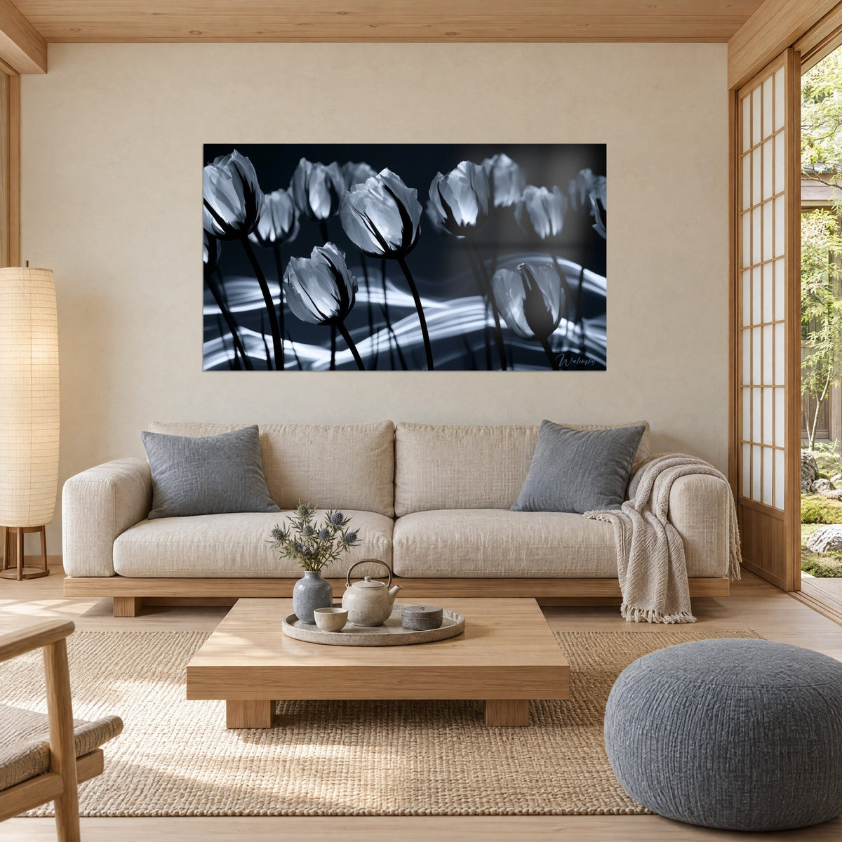 Wall art silver-white tulips on a midnight blue background, wavy ribbons of light, above a sofa in a bright living room